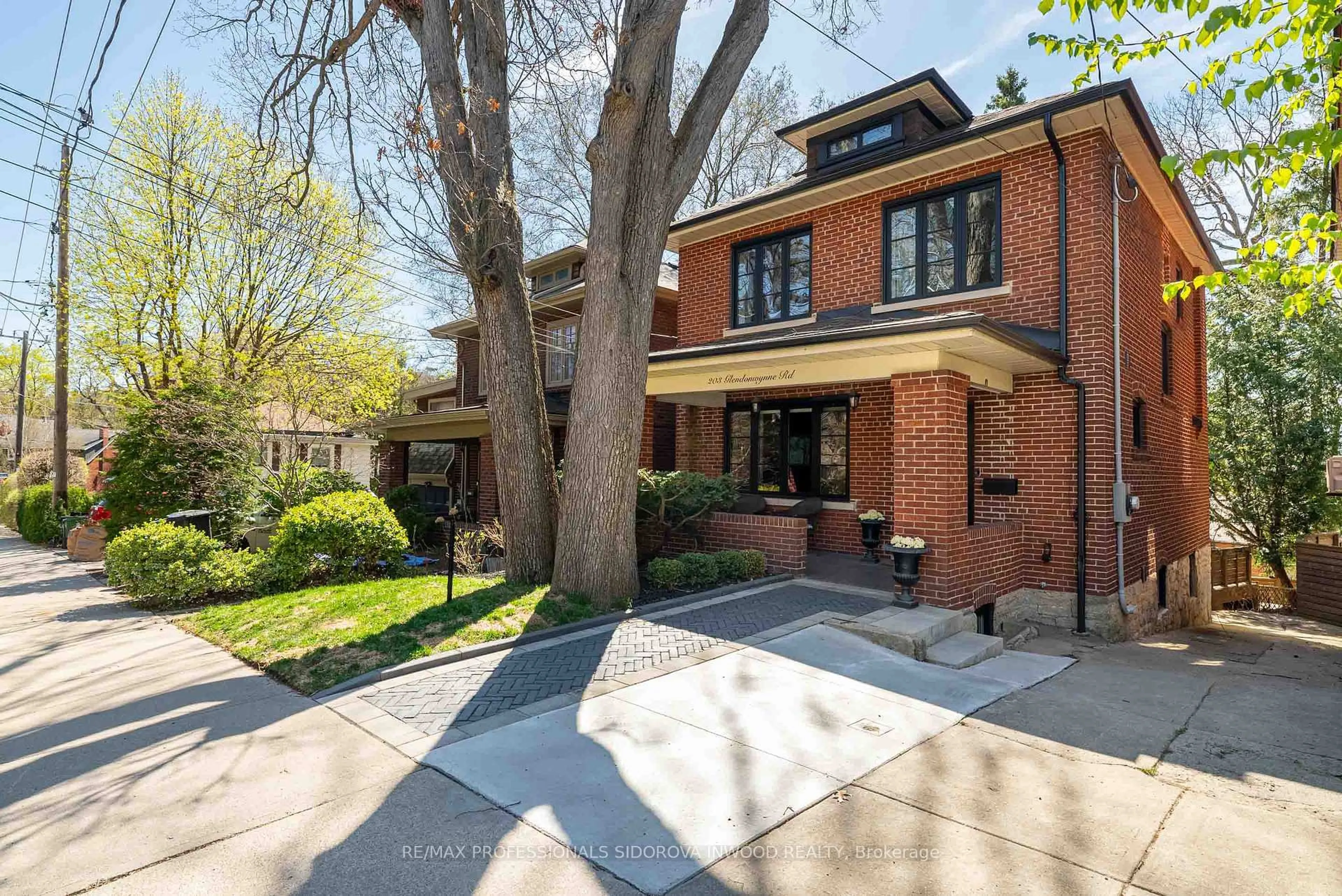 Home with brick exterior material, street for 203 Glendonwynne Rd, Toronto Ontario M6P 3E9