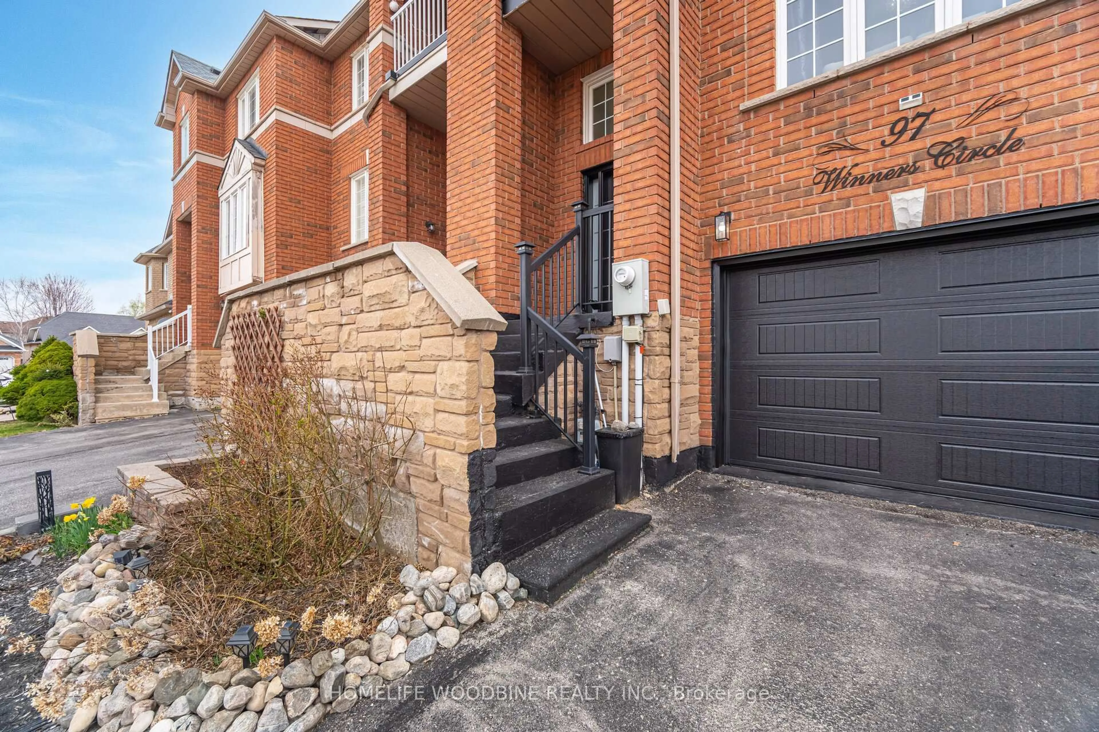 Home with brick exterior material, street for 97 Winners Circ, Brampton Ontario L7A 1M2