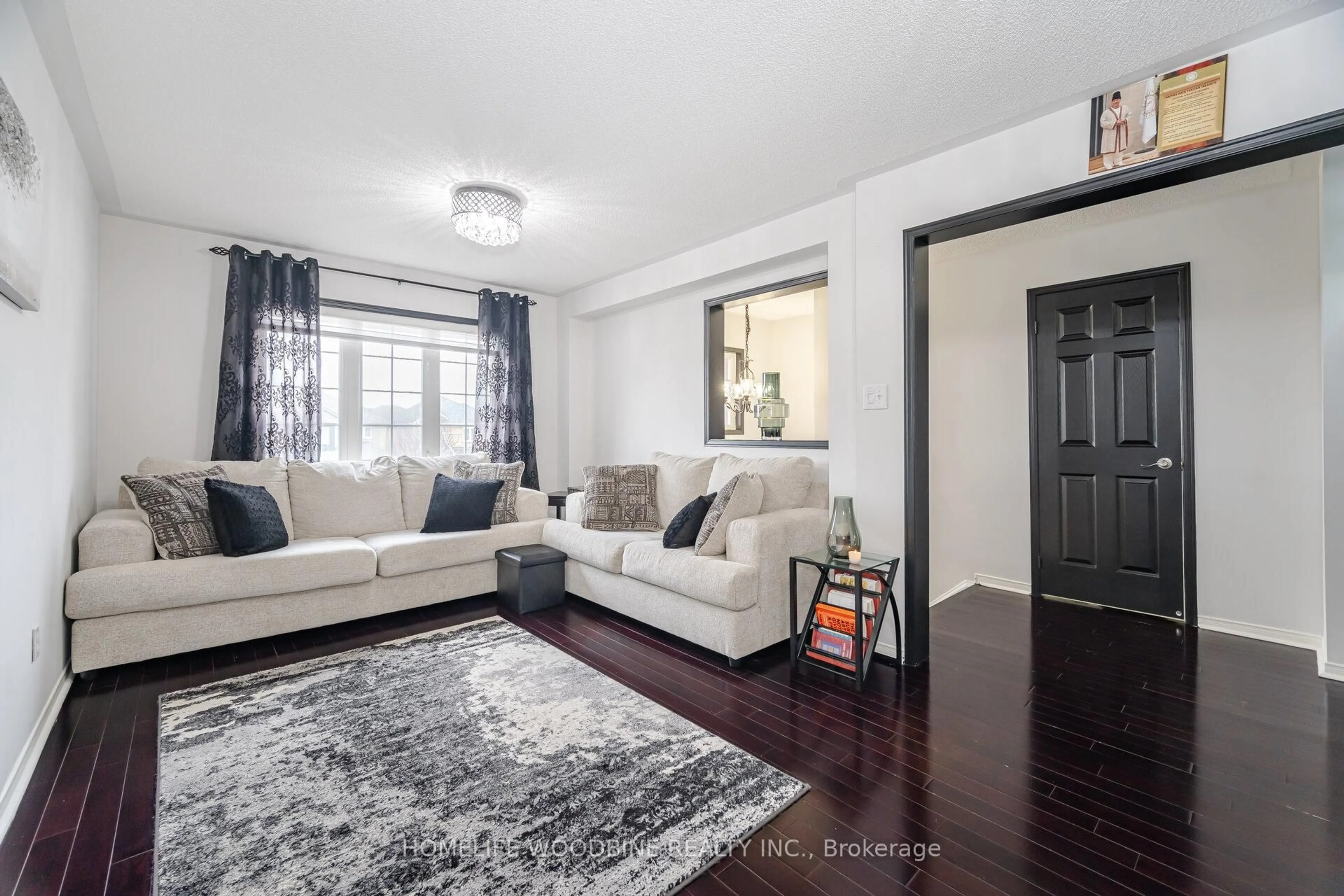 Living room with furniture, unknown for 97 Winners Circ, Brampton Ontario L7A 1M2