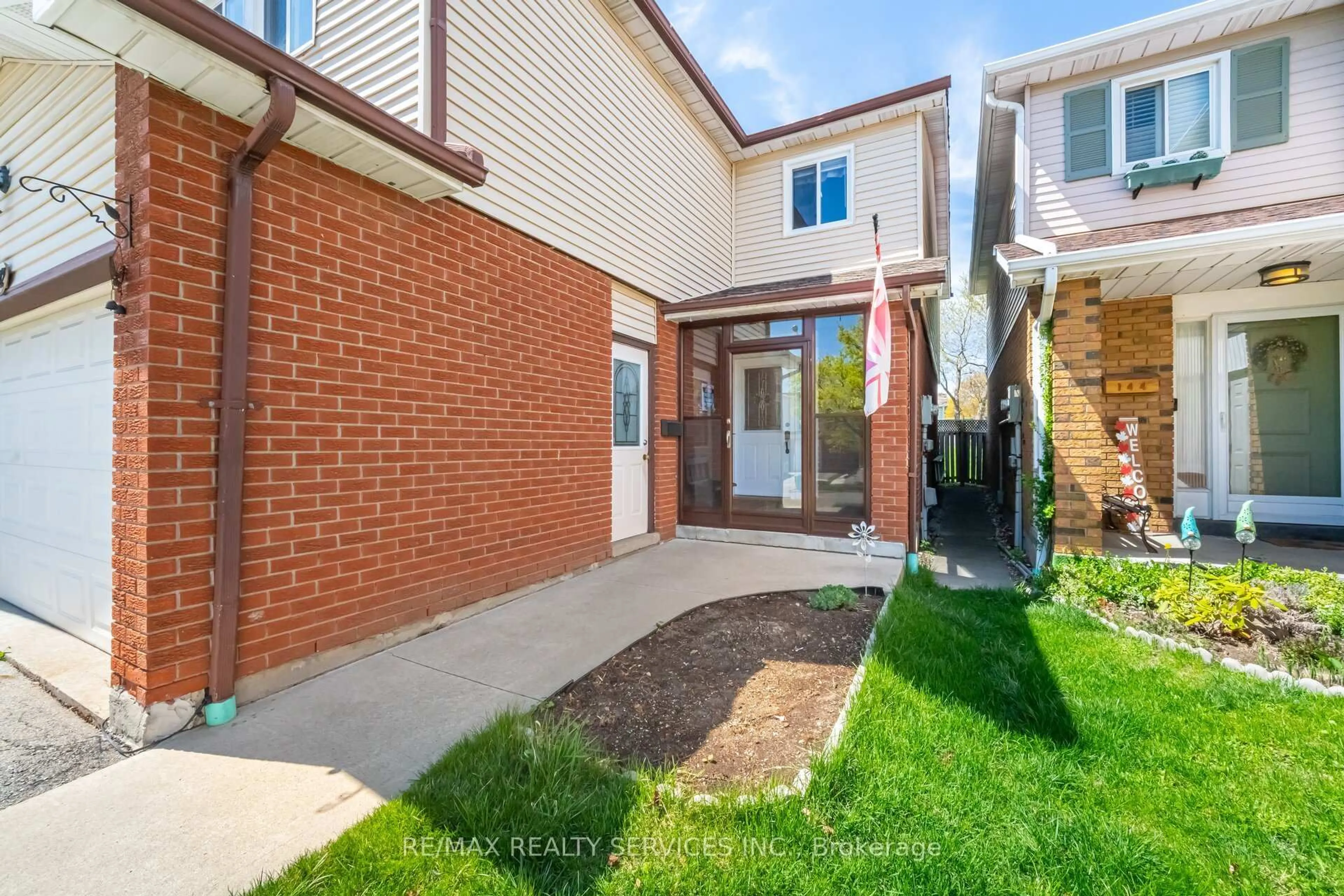Home with brick exterior material, street for 142 Elderwood Pl, Brampton Ontario L6V 3N3