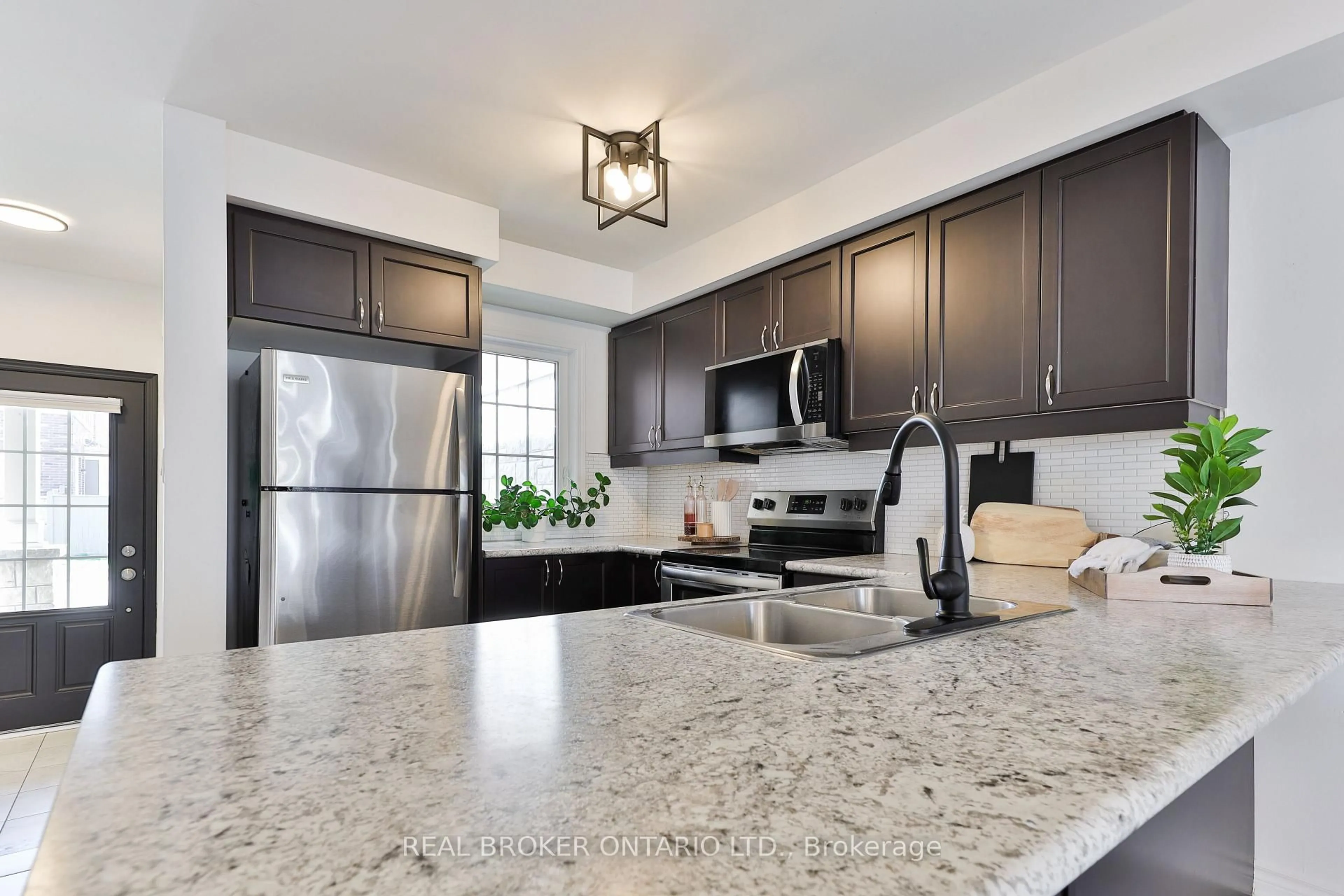 Open concept kitchen, unknown for 280 Jean Landing St, Milton Ontario L9E 1C7