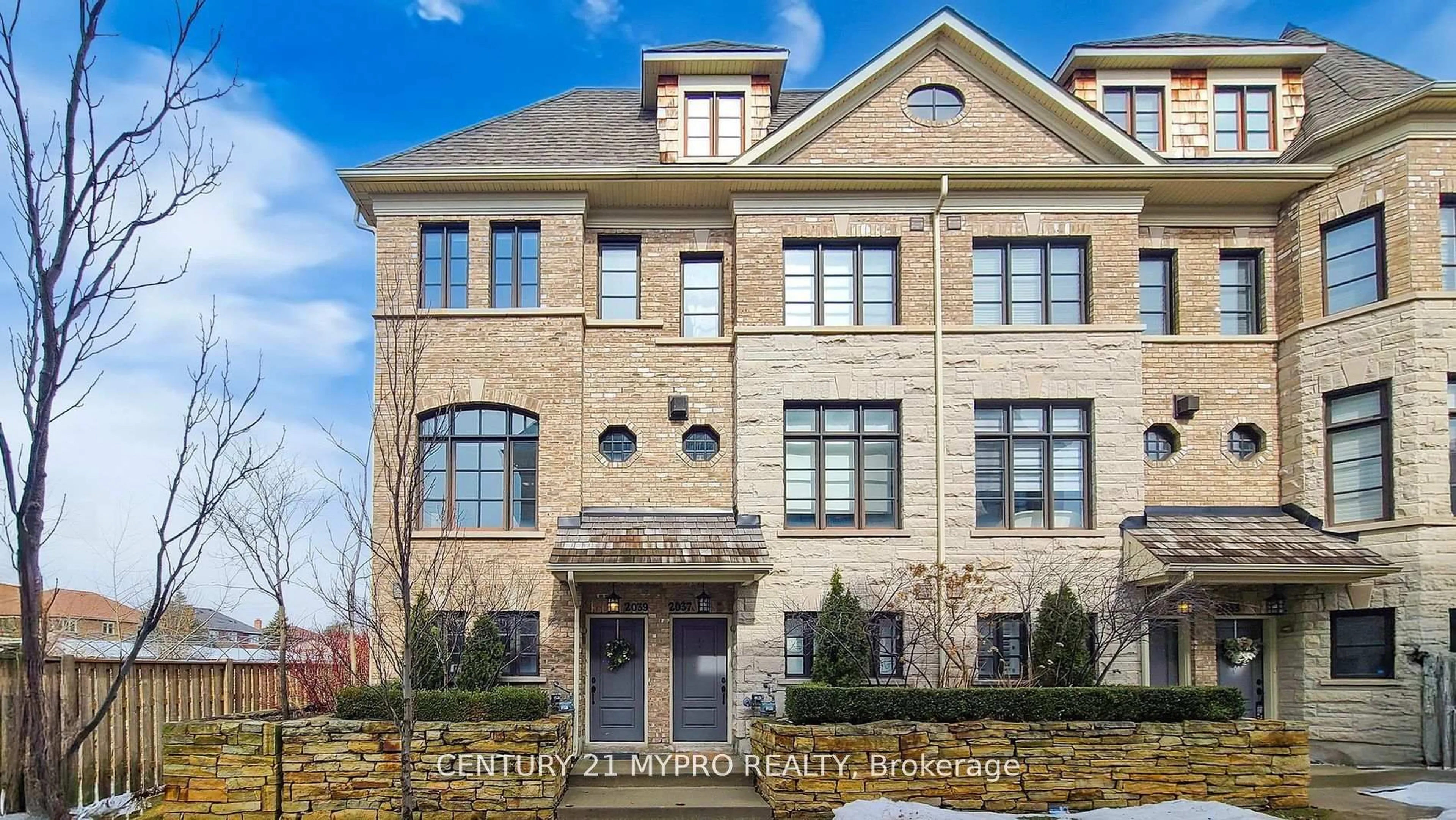 Home with brick exterior material, building for 2039 Queensborough Gate #47, Mississauga Ontario L5M 0Y1