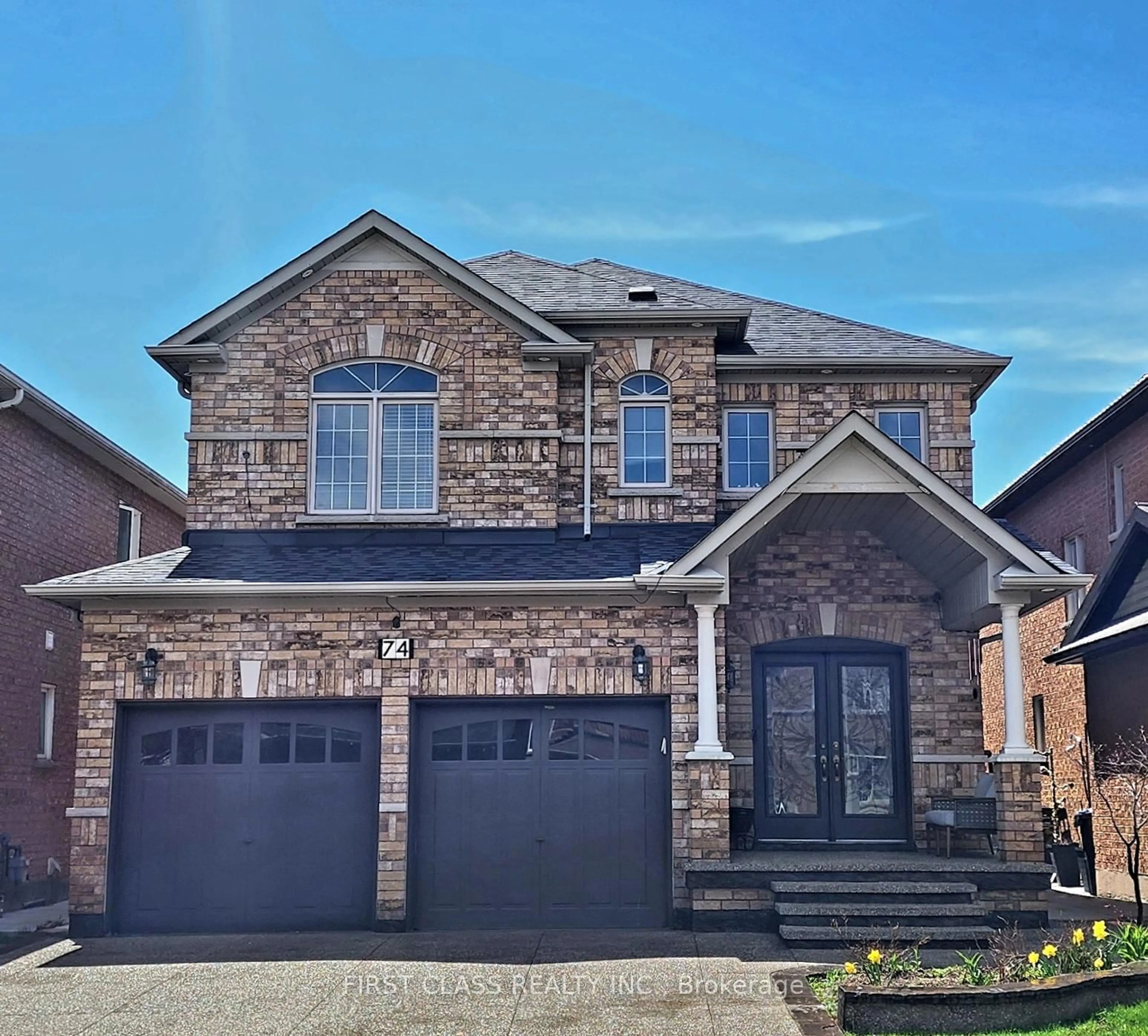 Home with brick exterior material, street for 74 Long Meadow Dr, Brampton Ontario L6P 2A1