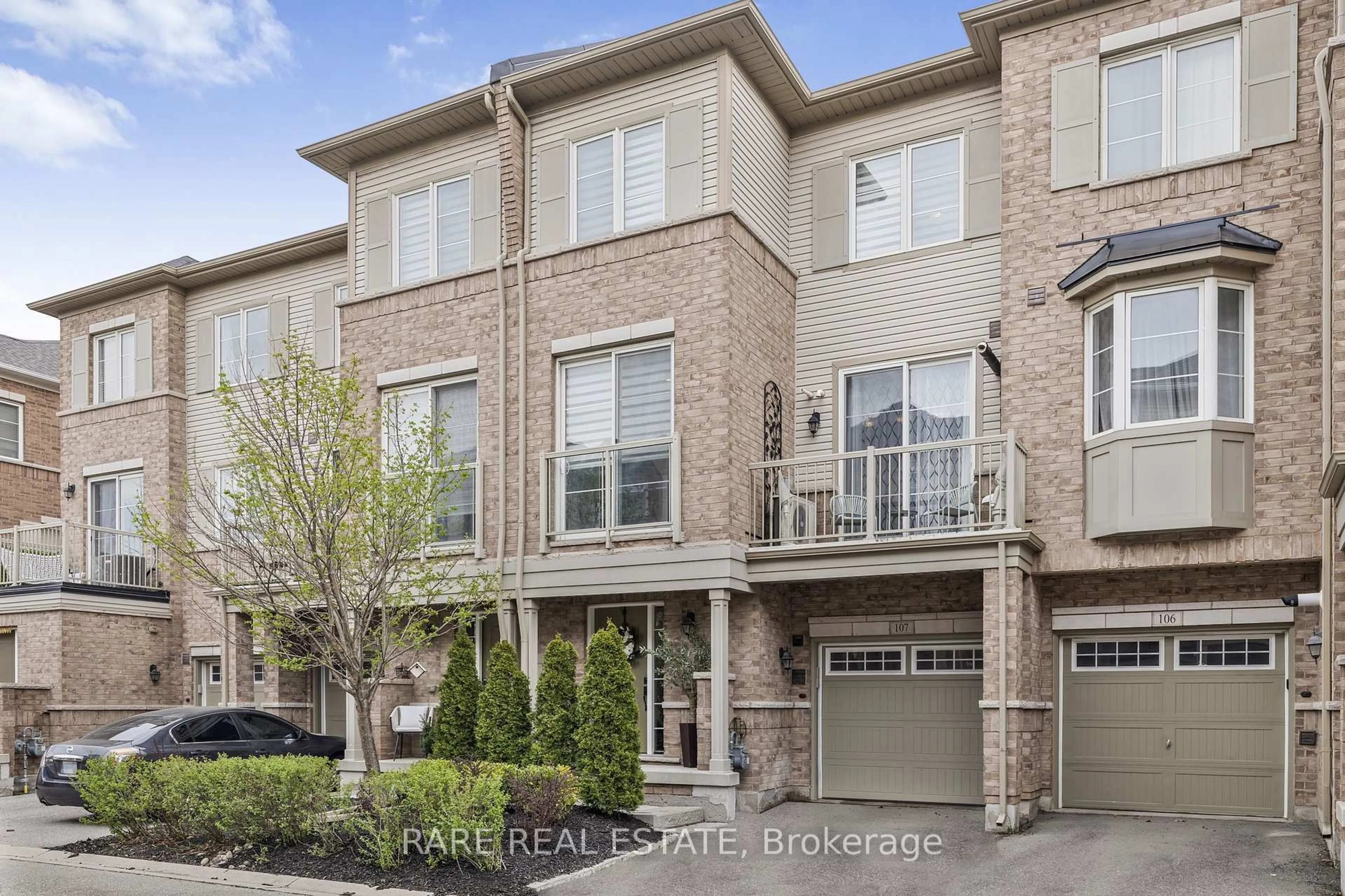Home with brick exterior material, street for 165 Hampshire Way #107, Milton Ontario L9T 8M7