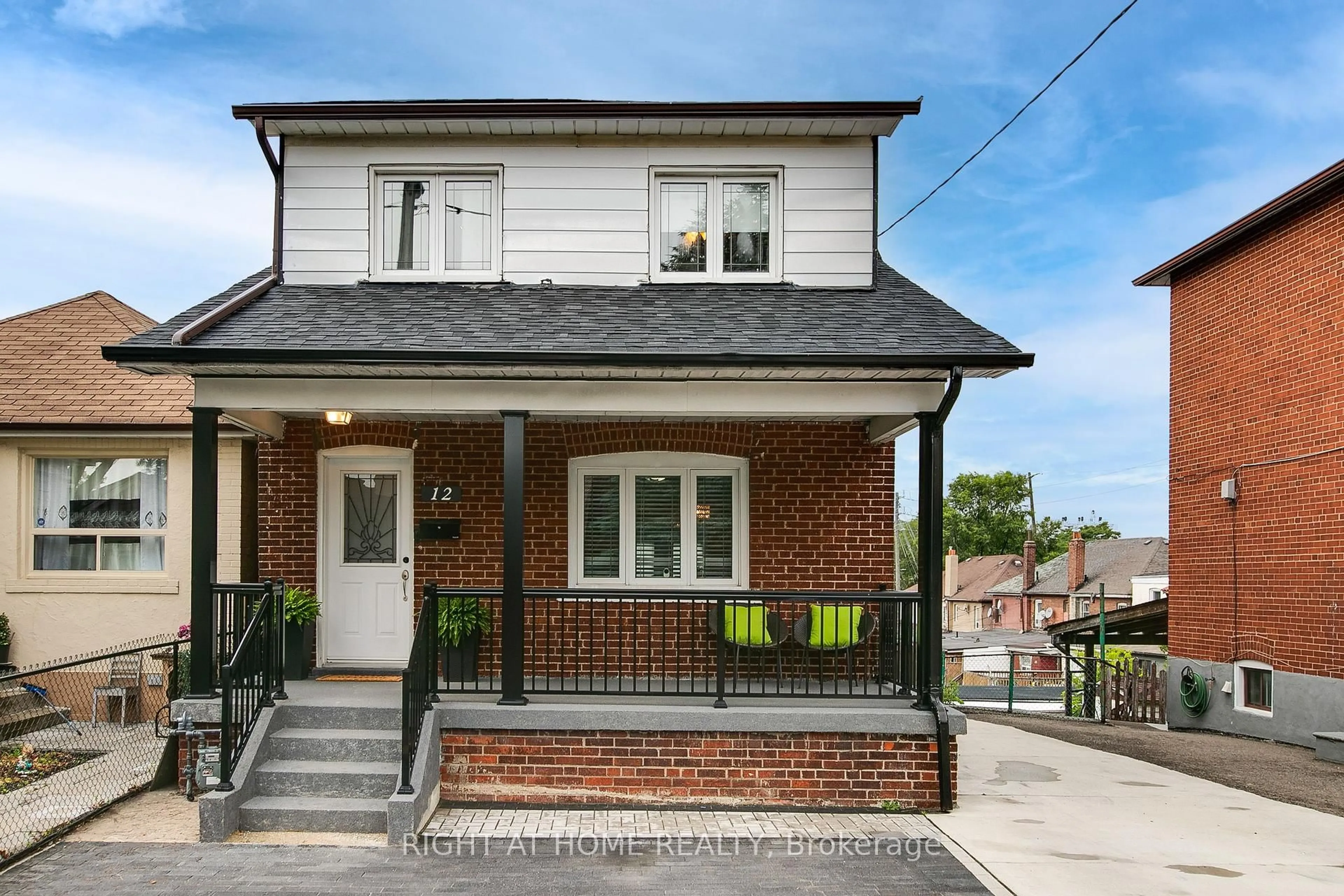 Home with brick exterior material, street for 12 Porter Ave, Toronto Ontario M6N 2G9