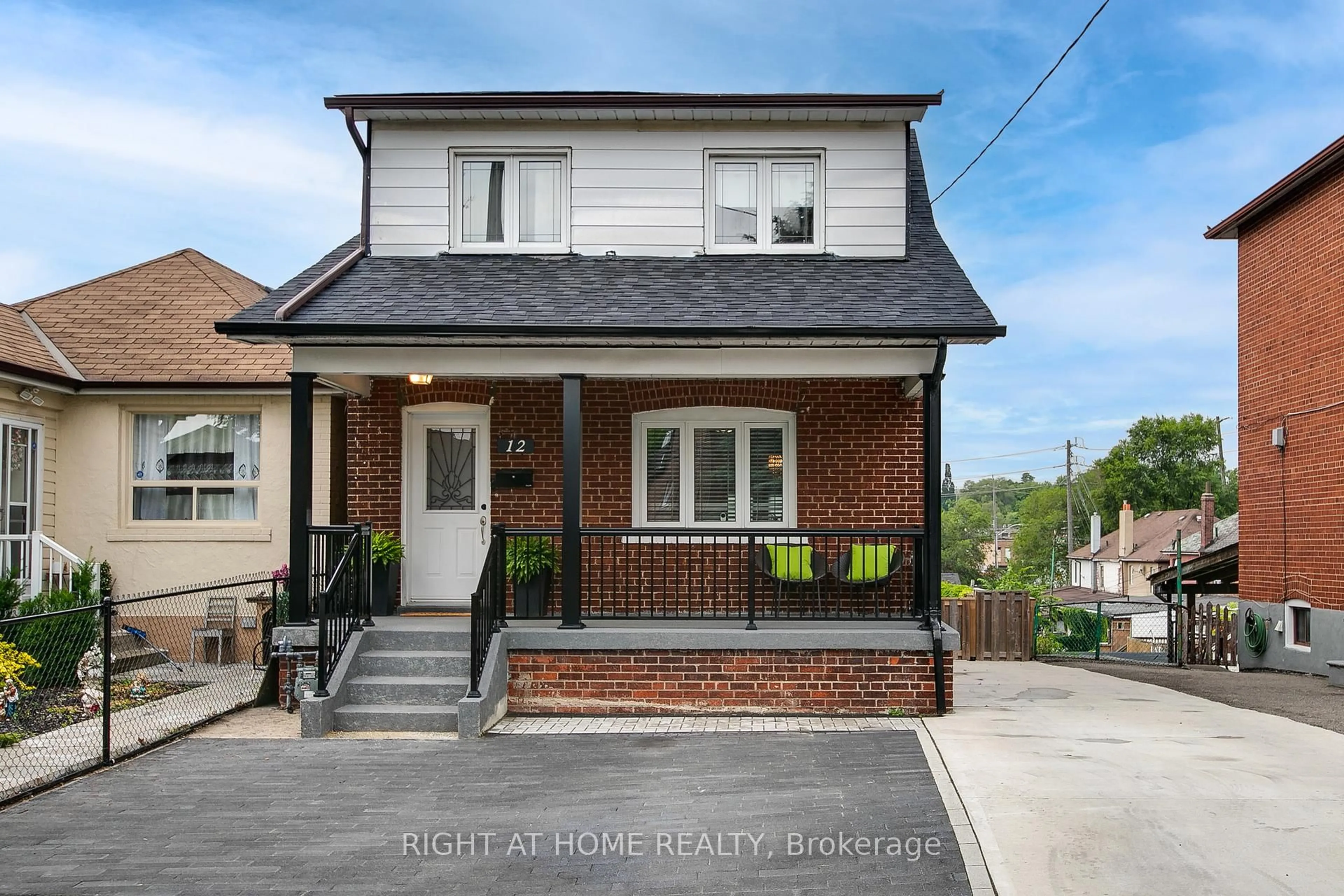 Home with brick exterior material, street for 12 Porter Ave, Toronto Ontario M6N 2G9