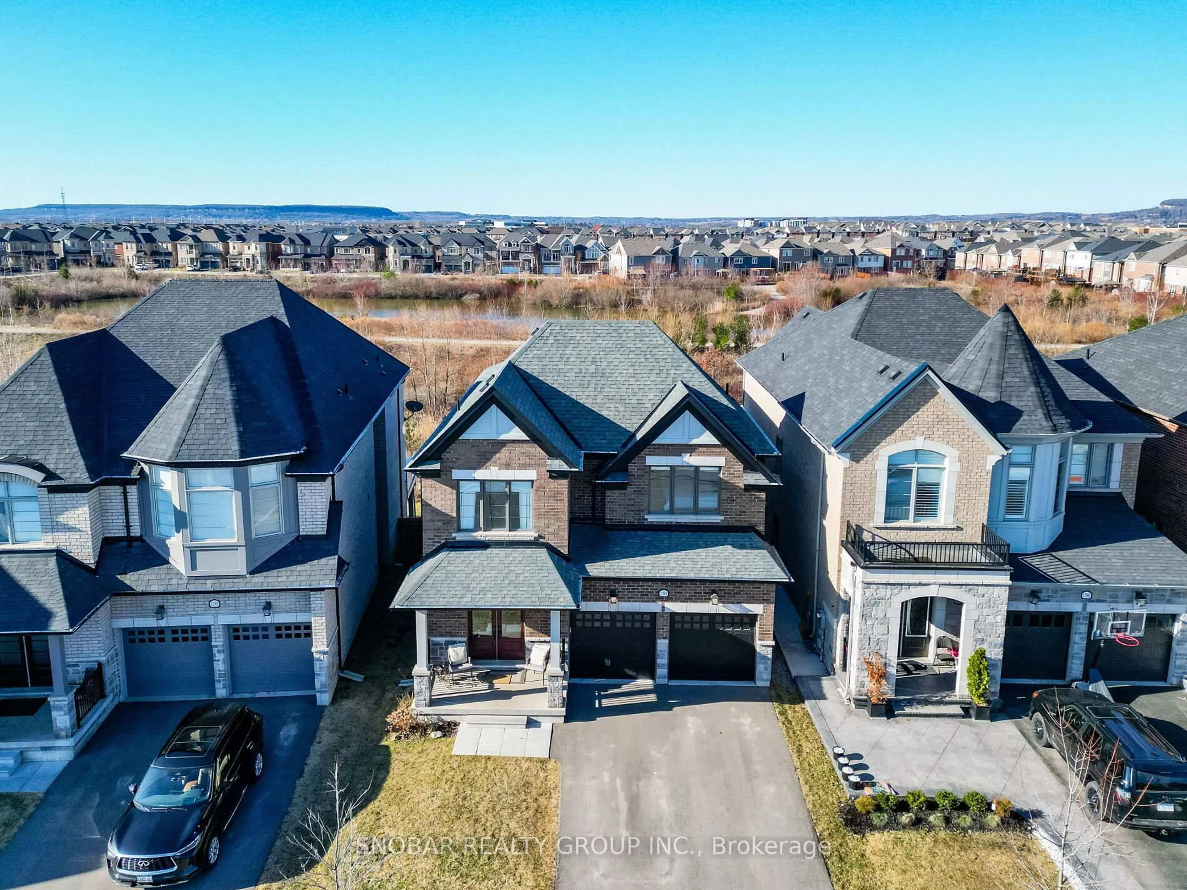 A pic from outside/outdoor area/front of a property/back of a property/a pic from drone, street for 1284 Whitney Terr, Milton Ontario L9E 1K5