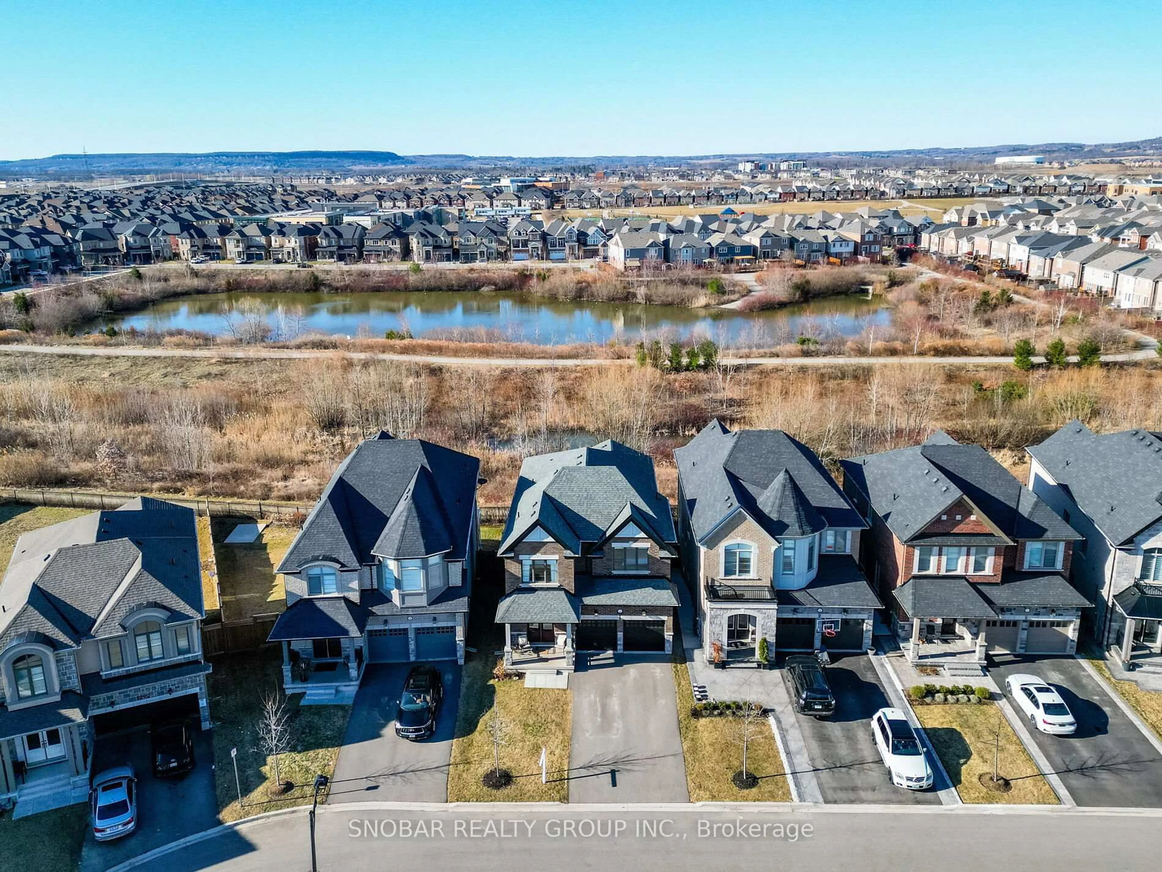 A pic from outside/outdoor area/front of a property/back of a property/a pic from drone, water/lake/river/ocean view for 1284 Whitney Terr, Milton Ontario L9E 1K5