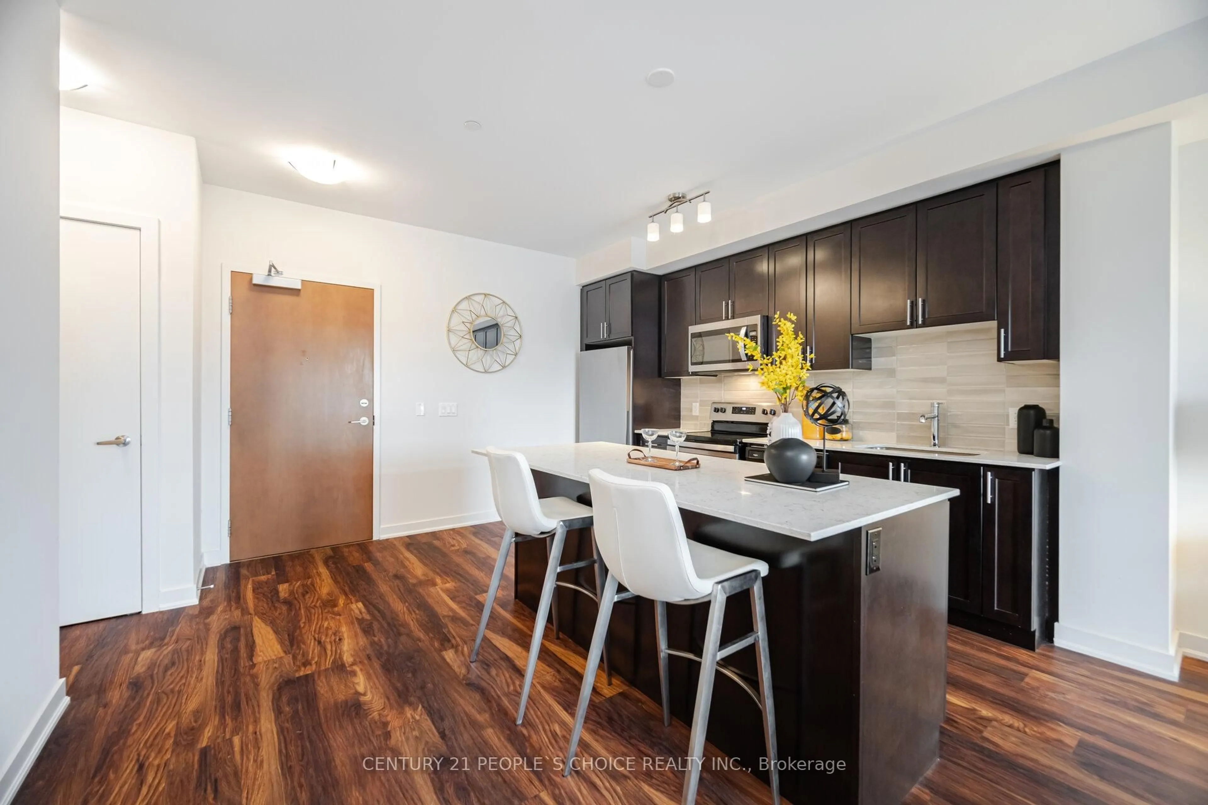 Open concept kitchen, wood/laminate floor for 340 Plains Rd #504, Burlington Ontario L7T 0C2