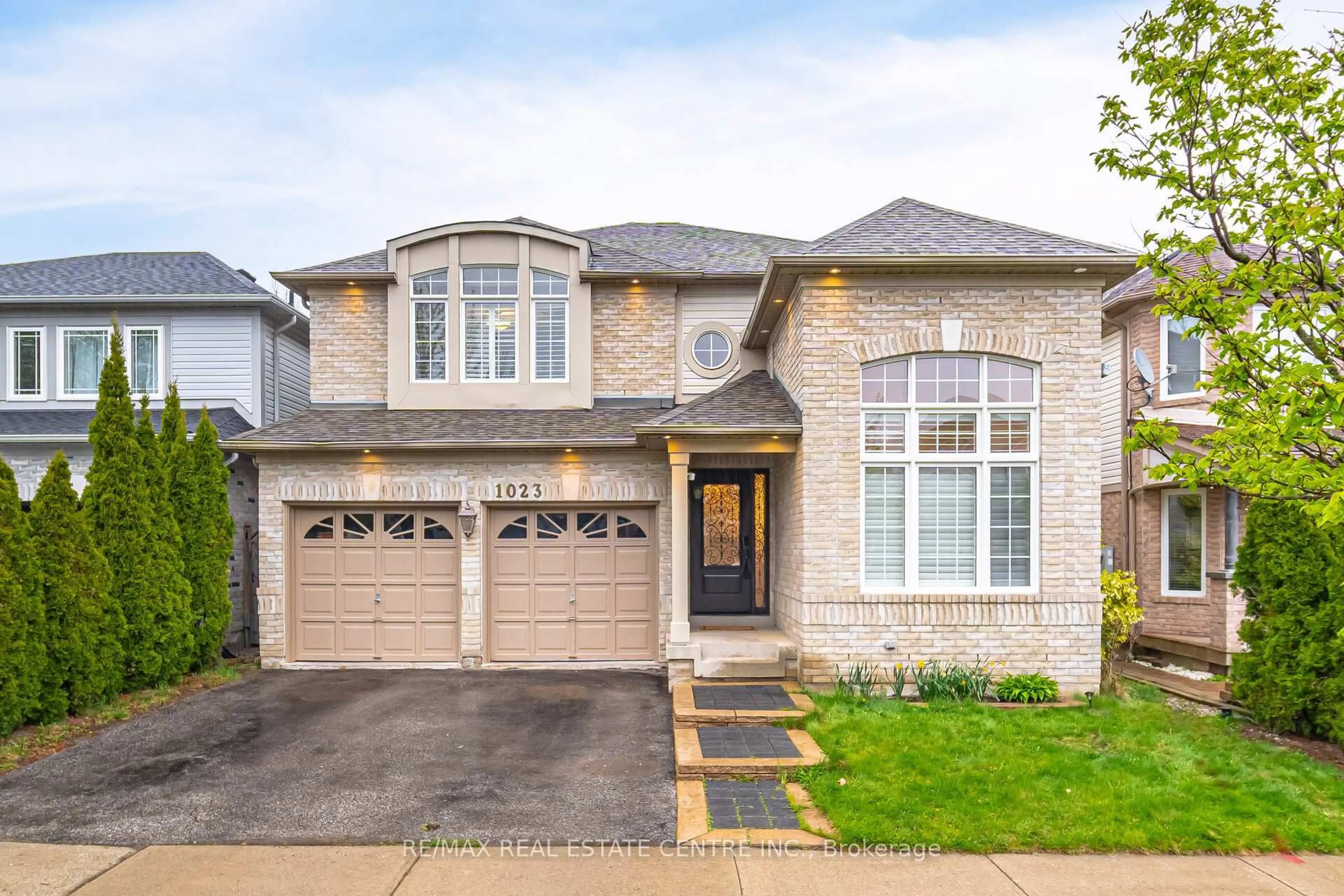 Home with brick exterior material, street for 1023 Freeman Tr, Milton Ontario L9T 5T3