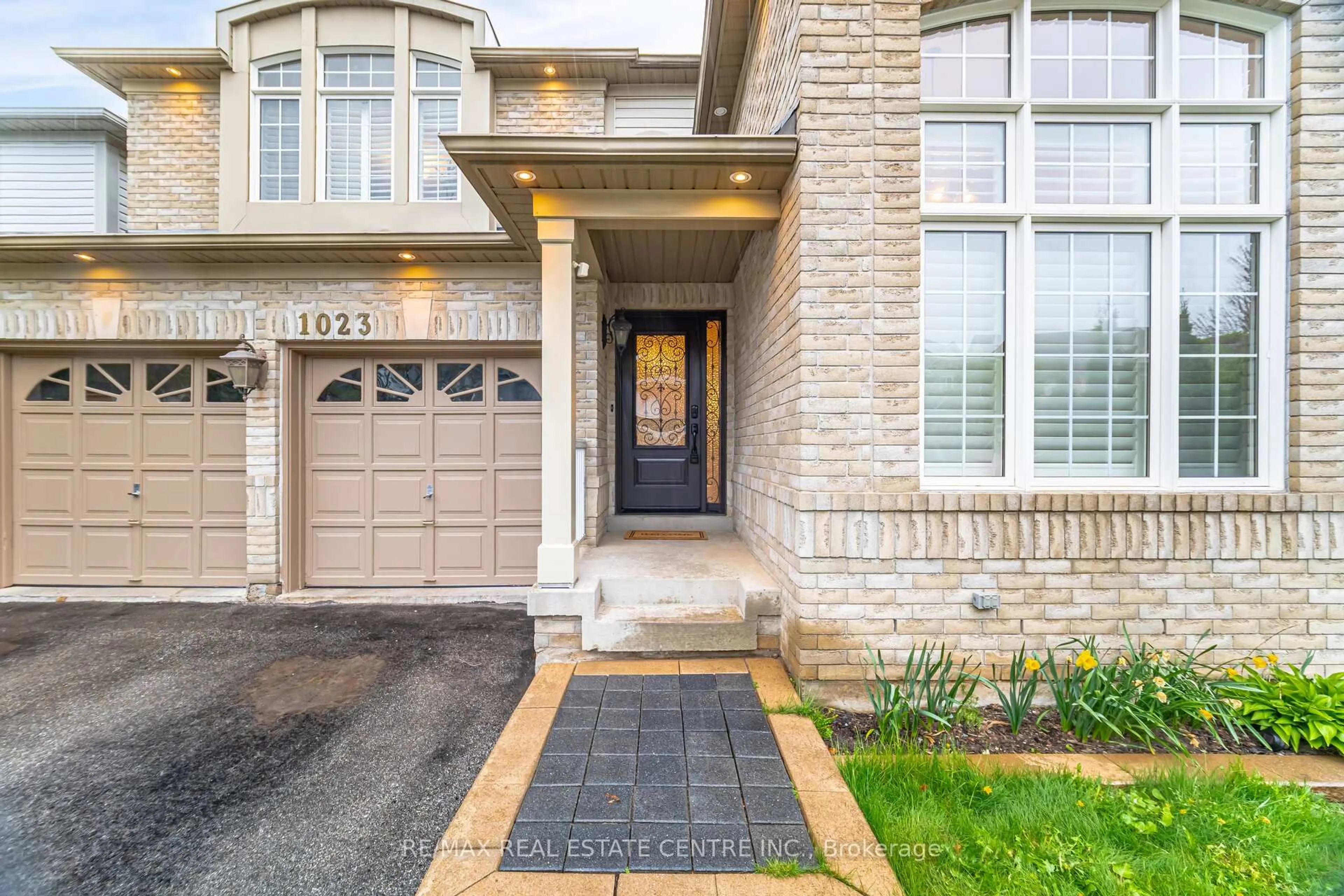 Home with brick exterior material, street for 1023 Freeman Tr, Milton Ontario L9T 5T3