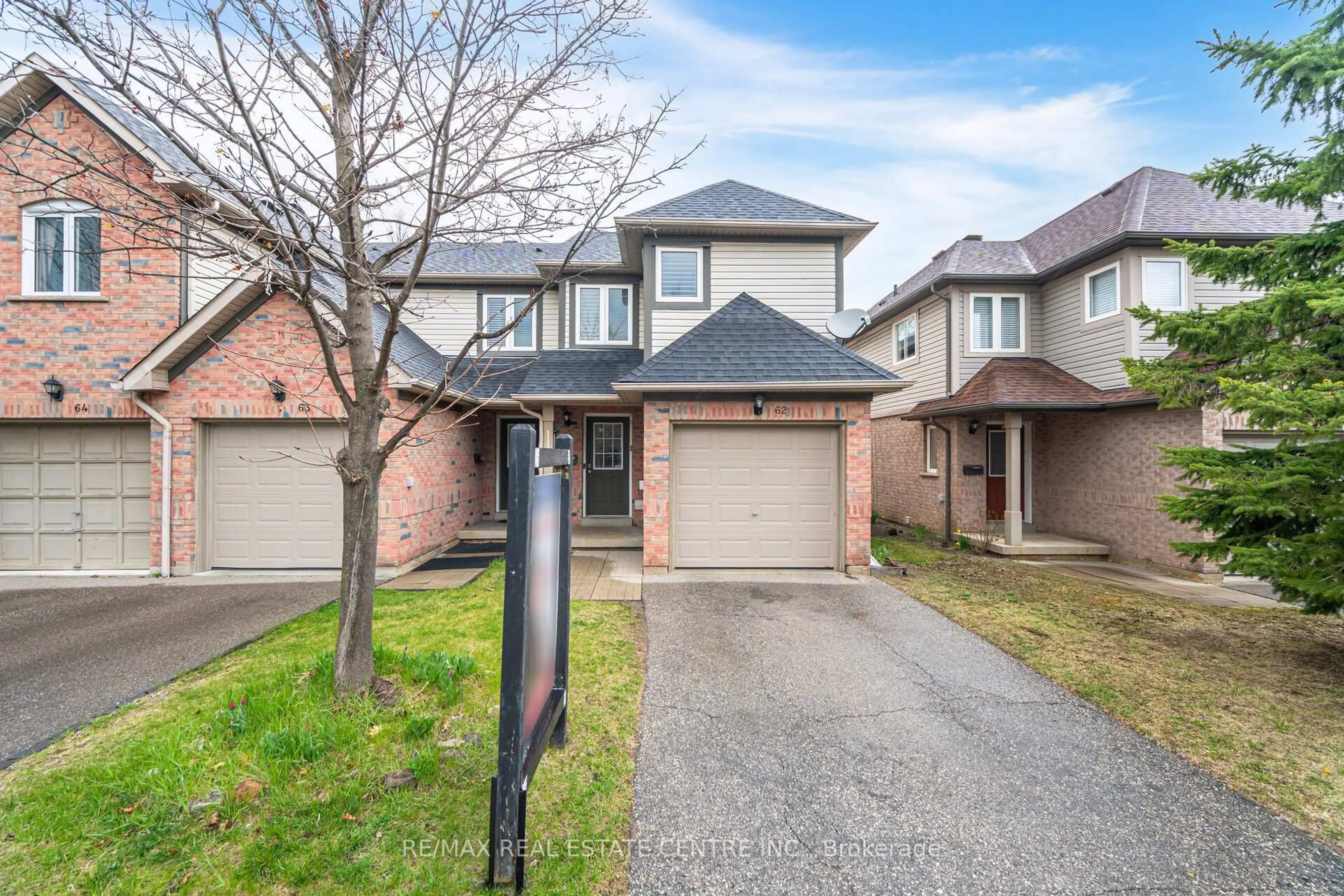 Home with brick exterior material, street for 5255 Guildwood Way #62, Mississauga Ontario L5R 4A8