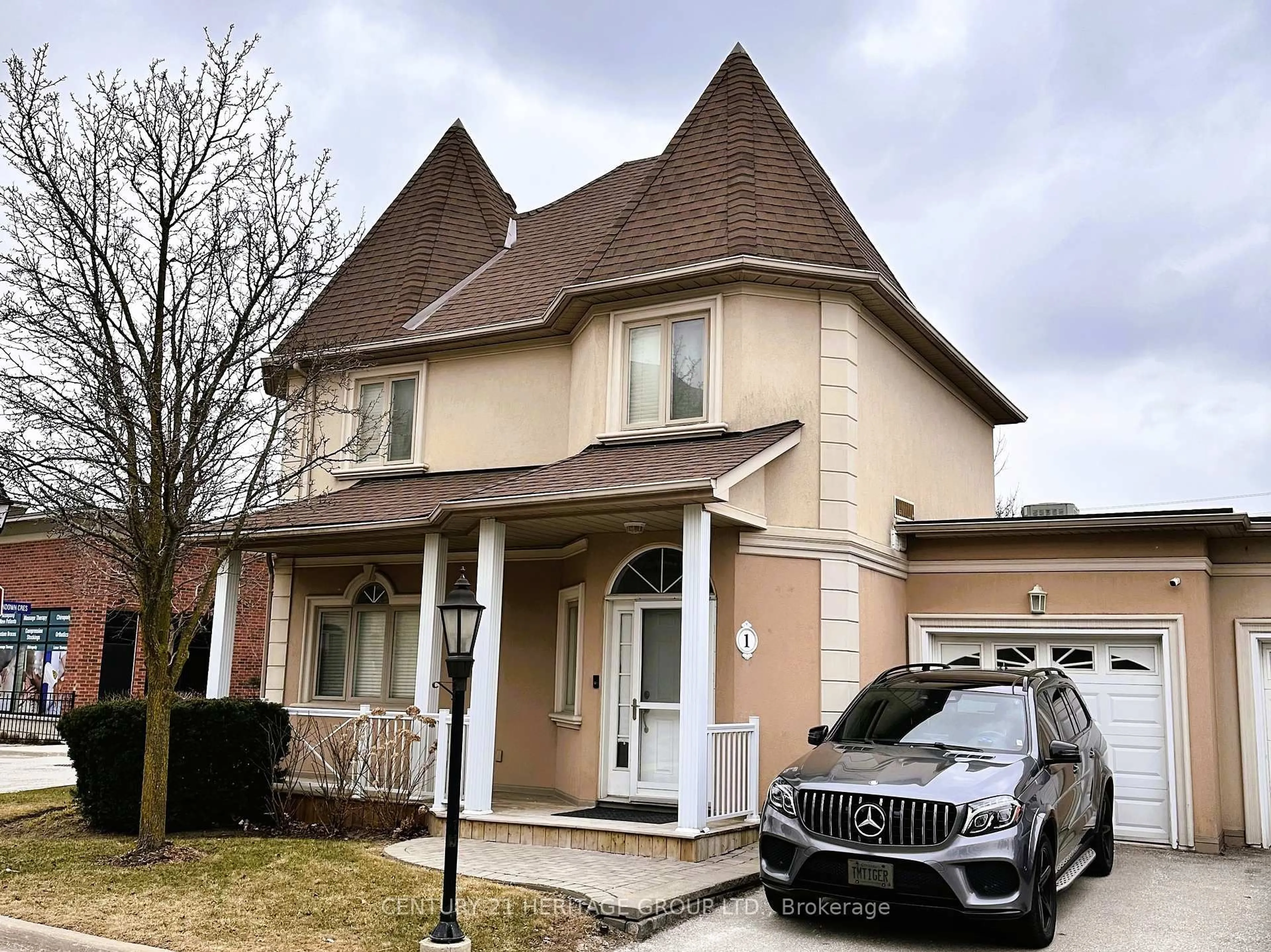 Home with brick exterior material, street for 1 Tower Gate #11, Brampton Ontario L6P 1C3