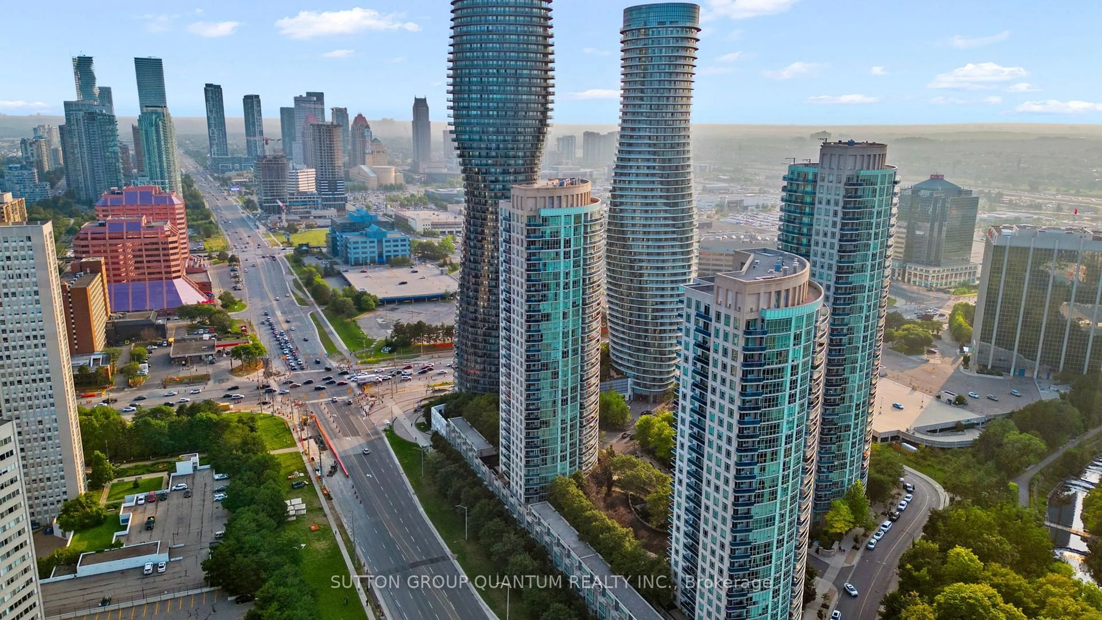 A pic from outside/outdoor area/front of a property/back of a property/a pic from drone, city buildings view from balcony for 90 Absolute Ave #302, Mississauga Ontario L4Z 0A3