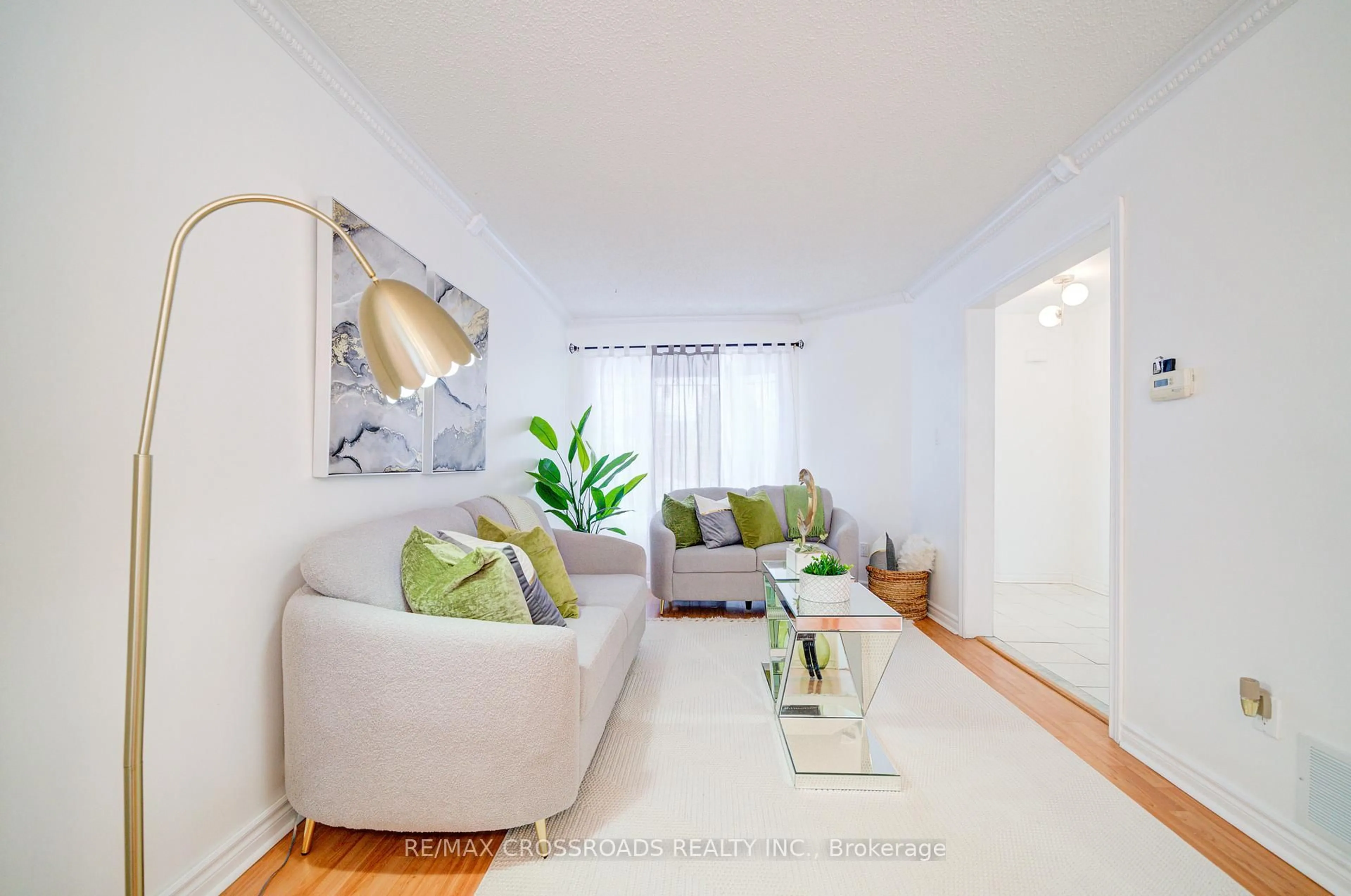 Living room with furniture, unknown for 115 Ecclestone Dr, Brampton Ontario L6X 3P4