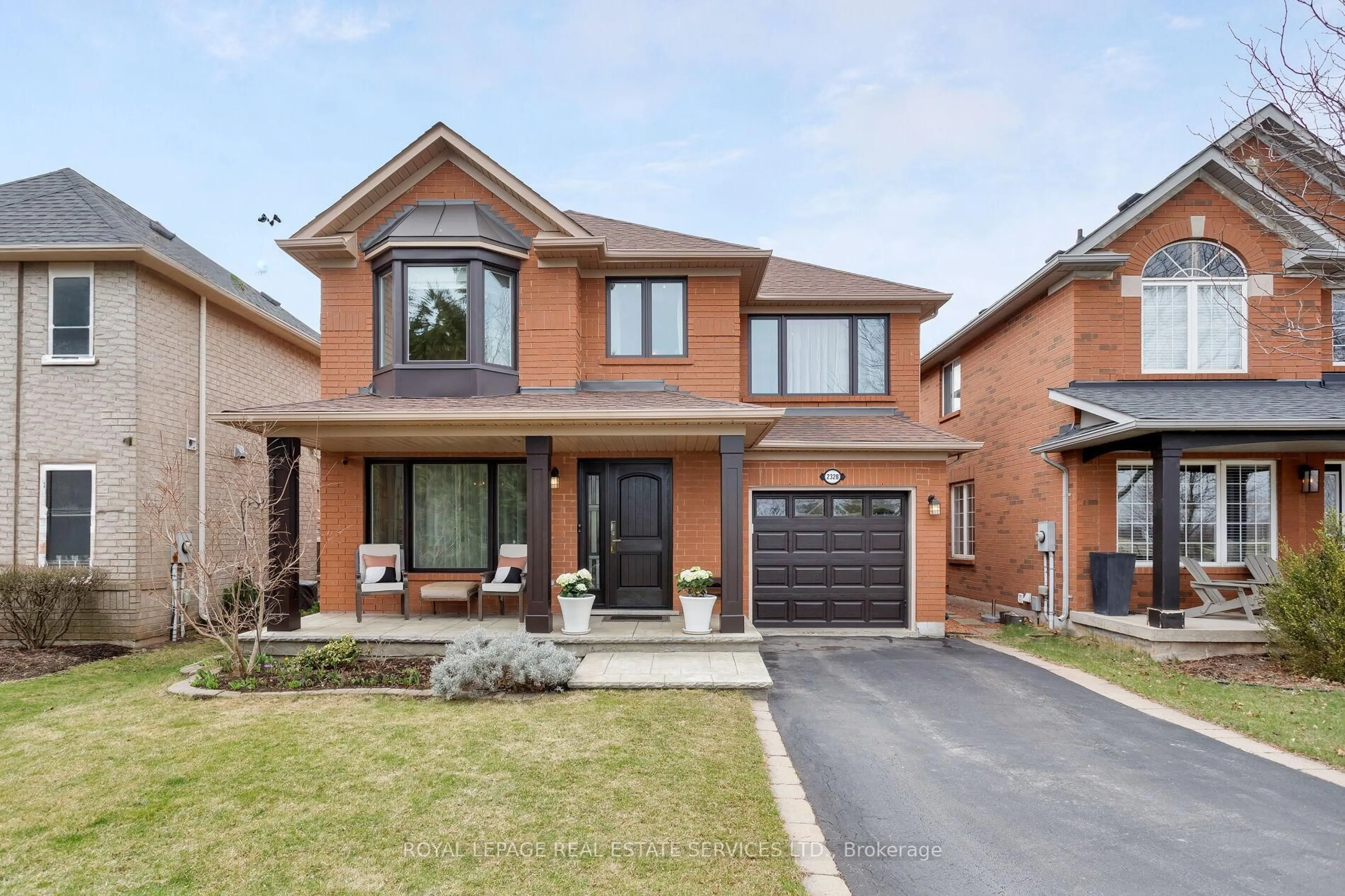 Home with brick exterior material, street for 2328 Proudfoot Tr, Oakville Ontario L6M 3Y2