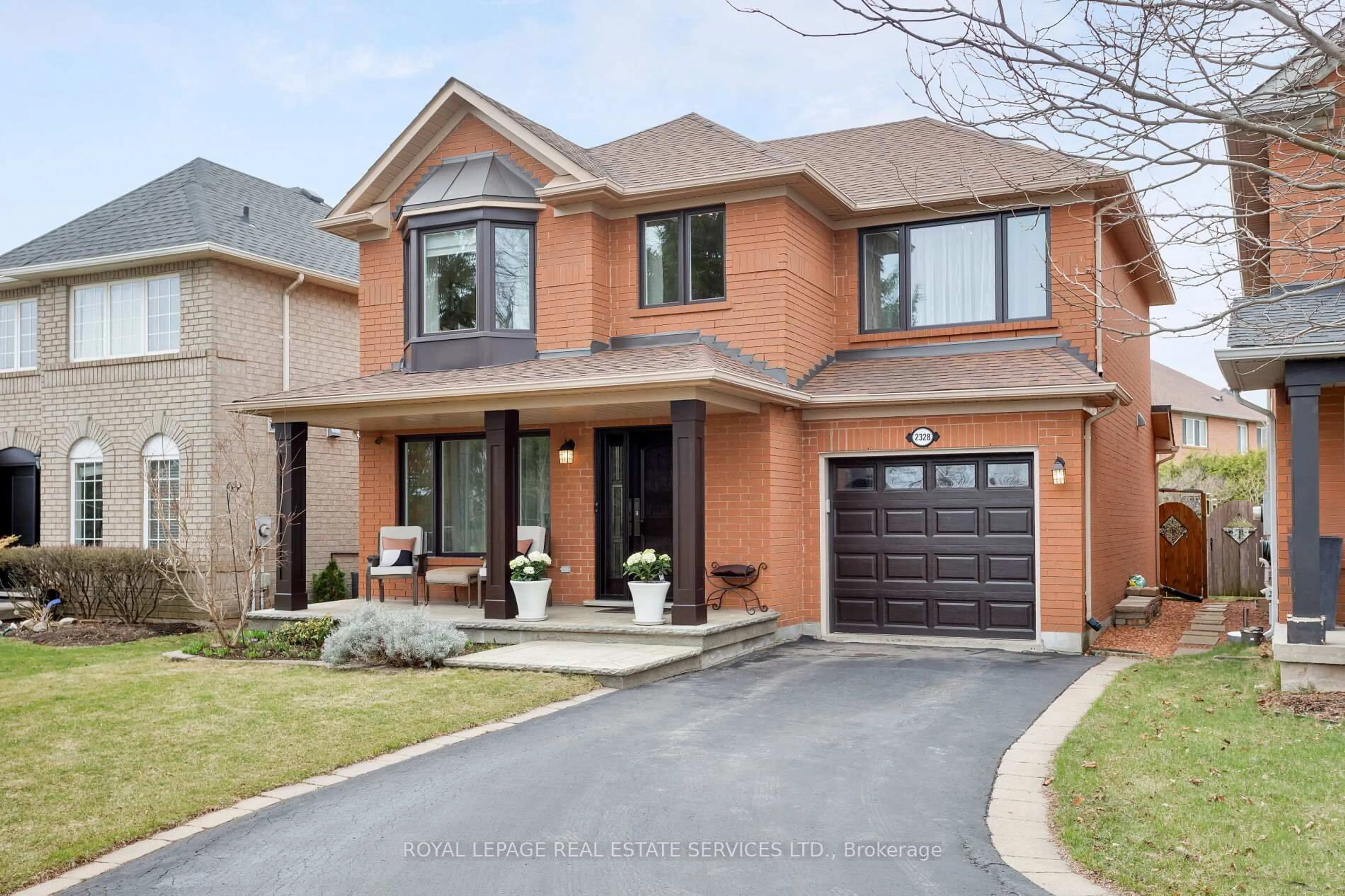 Home with brick exterior material, street for 2328 Proudfoot Tr, Oakville Ontario L6M 3Y2