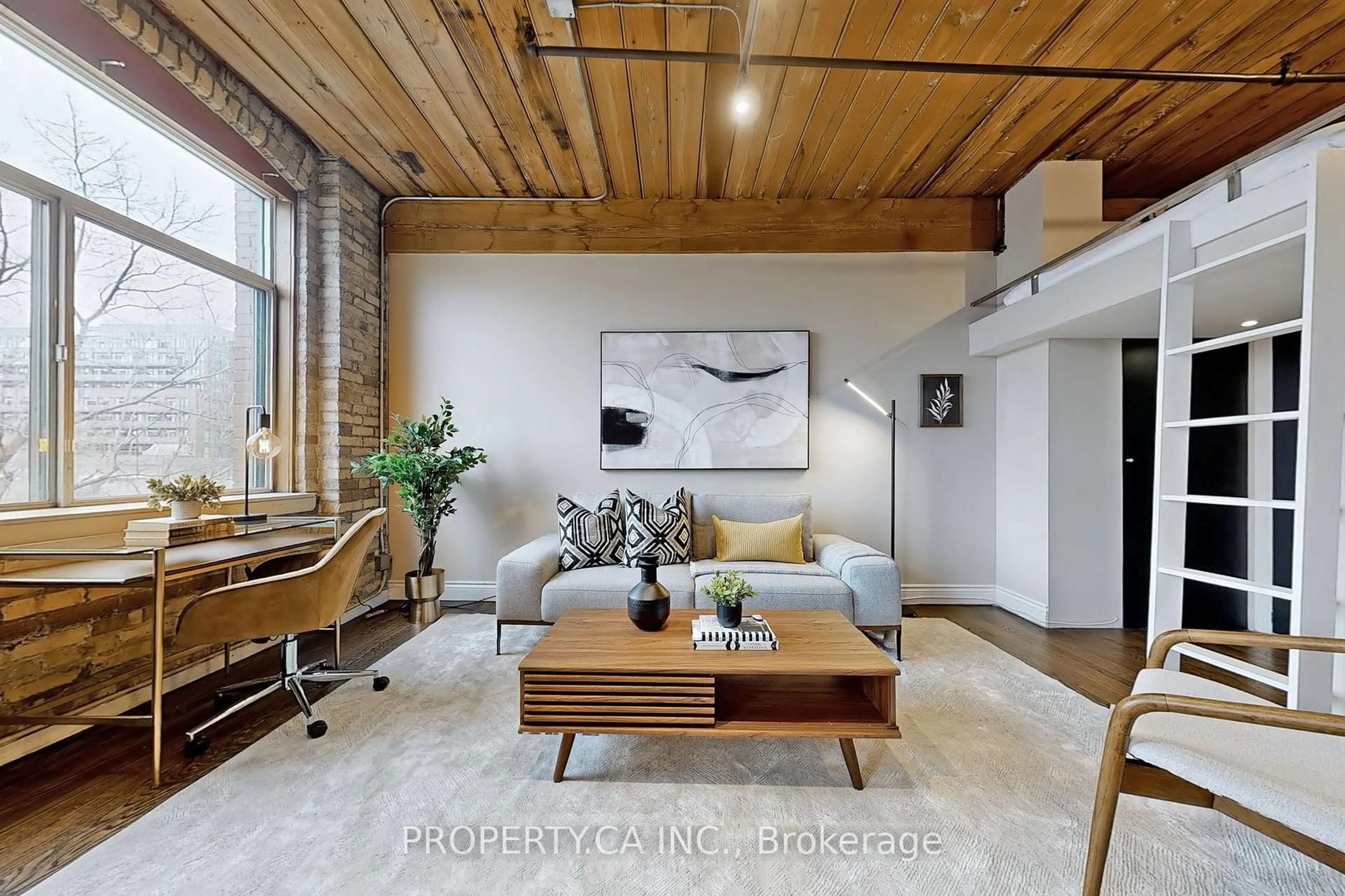 Living room with furniture, wood/laminate floor for 24 Noble St #210, Toronto Ontario M6K 2C8