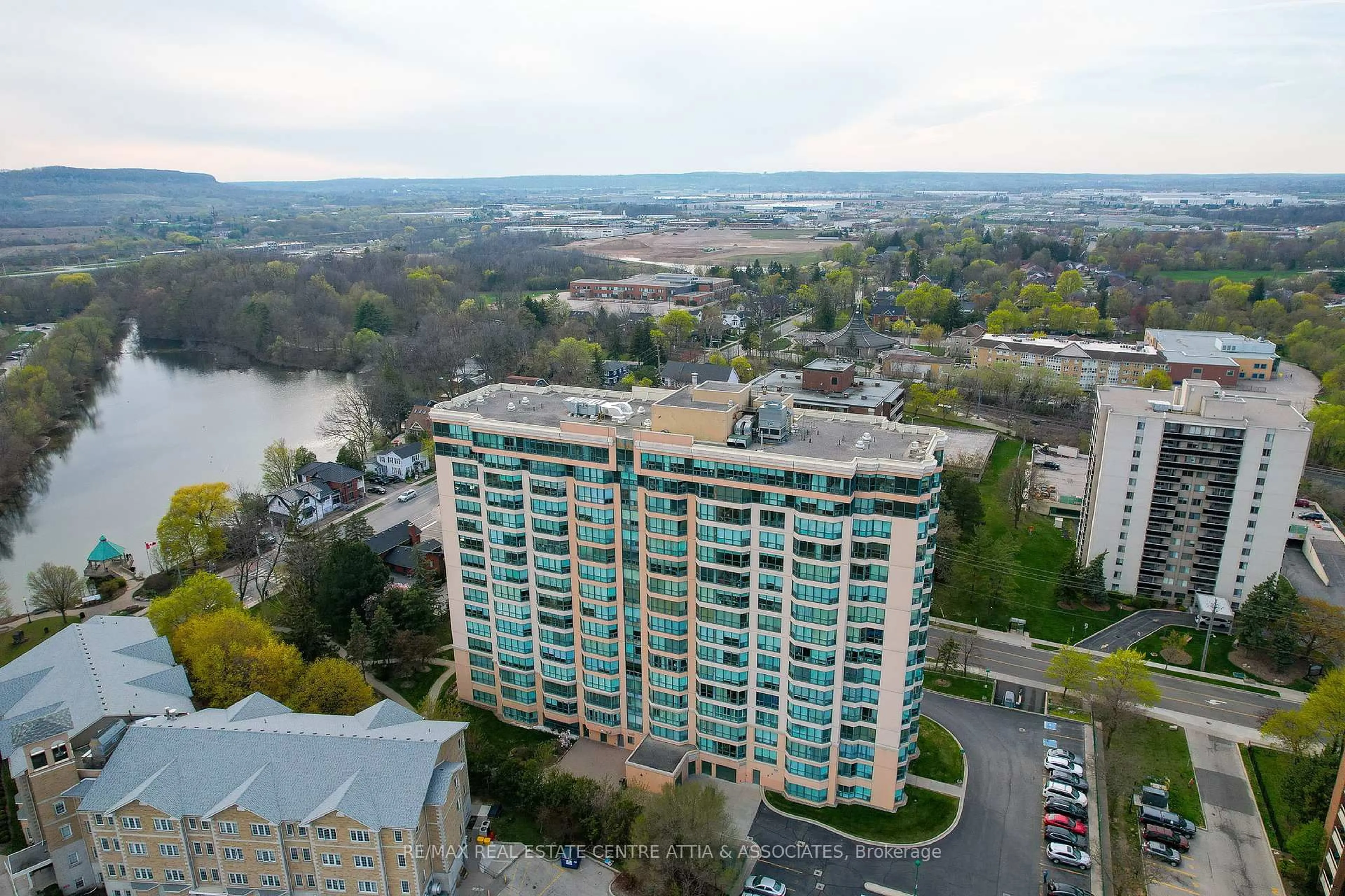 A pic from outside/outdoor area/front of a property/back of a property/a pic from drone, water/lake/river/ocean view for 100 Millside Dr #1501, Milton Ontario L9T 5E2