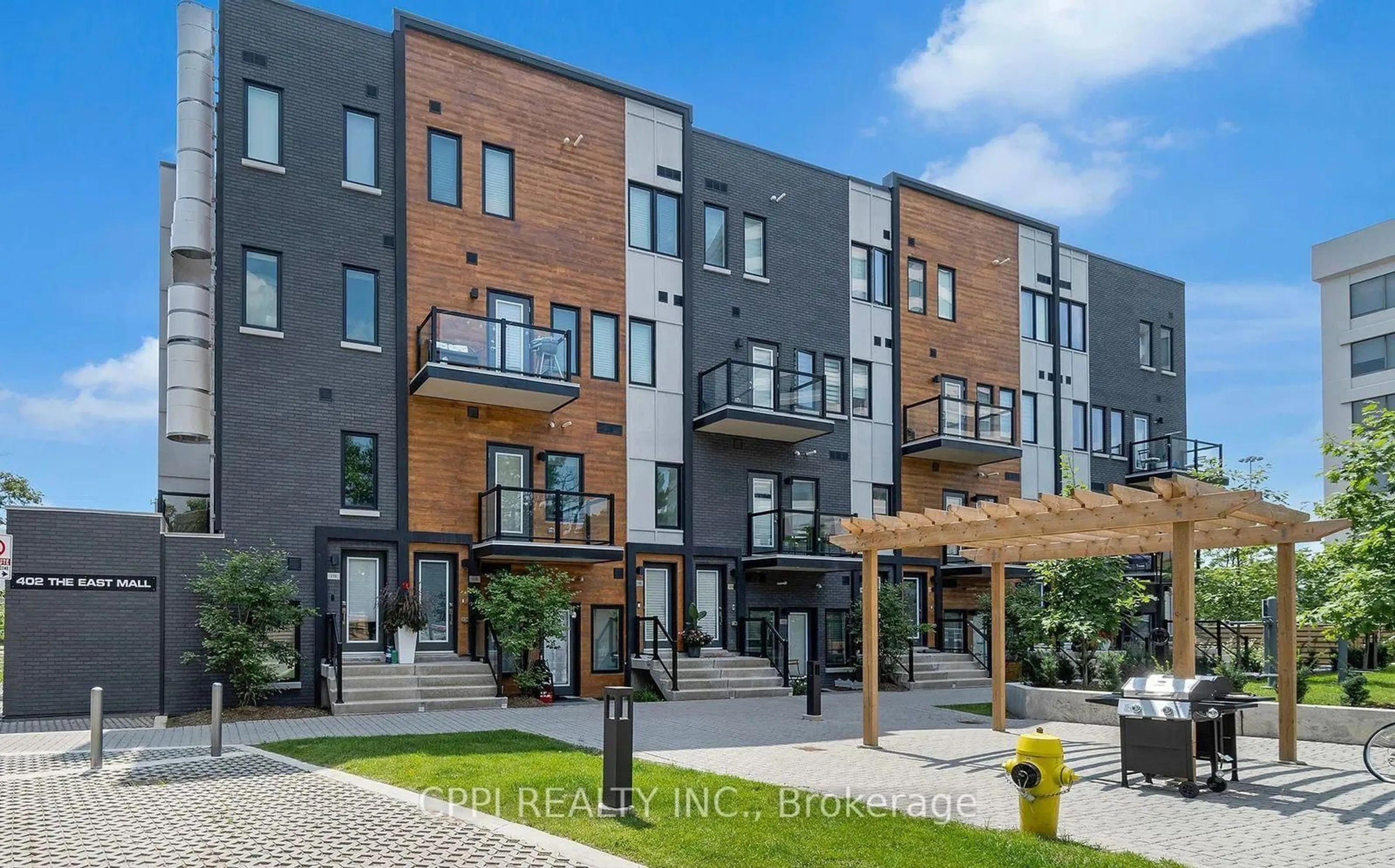 Home with brick exterior material, street for 402 The East Mall Dr #318, Toronto Ontario M9B 3Z9