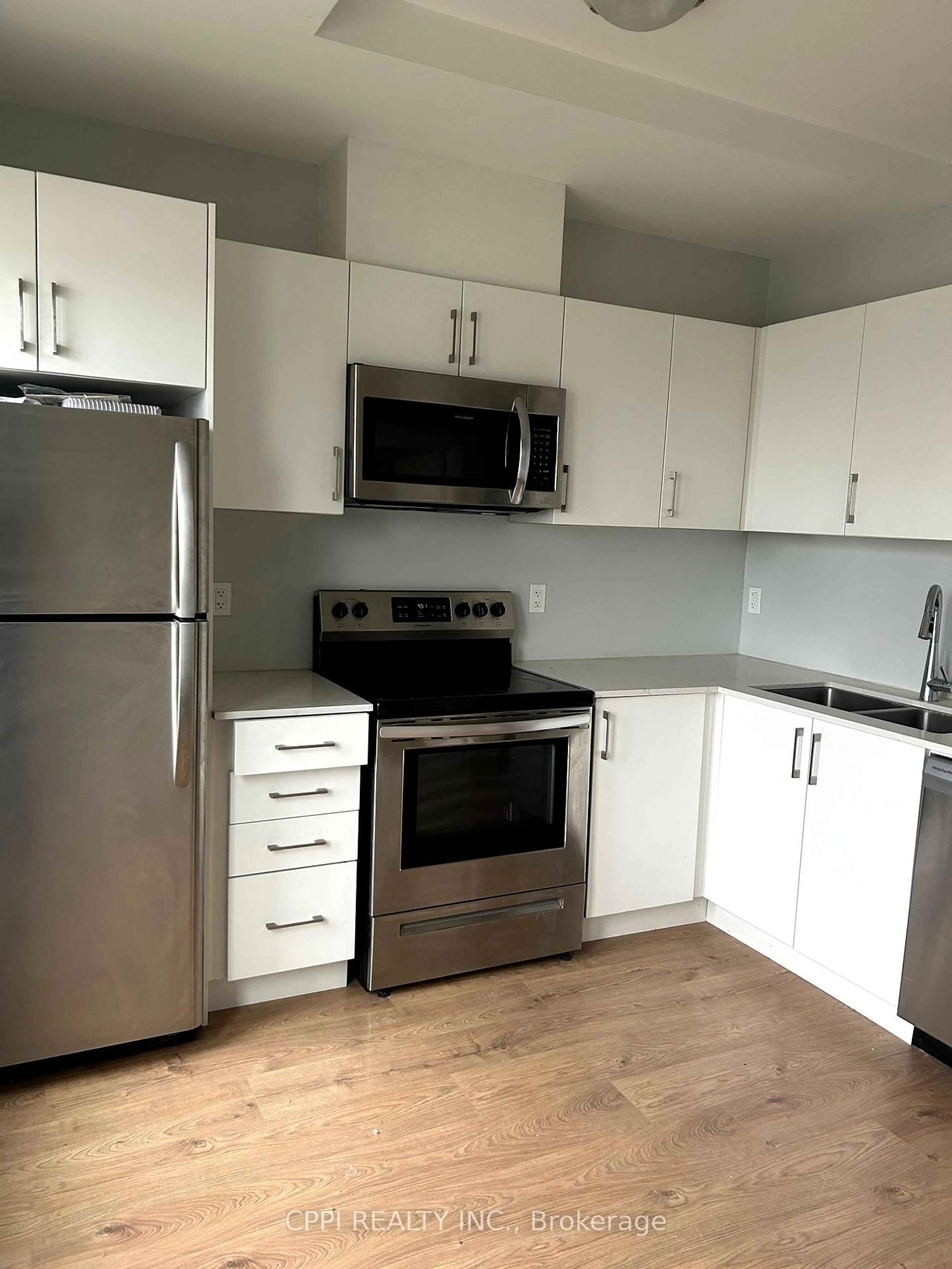 Standard kitchen, wood/laminate floor for 402 The East Mall Dr #318, Toronto Ontario M9B 3Z9