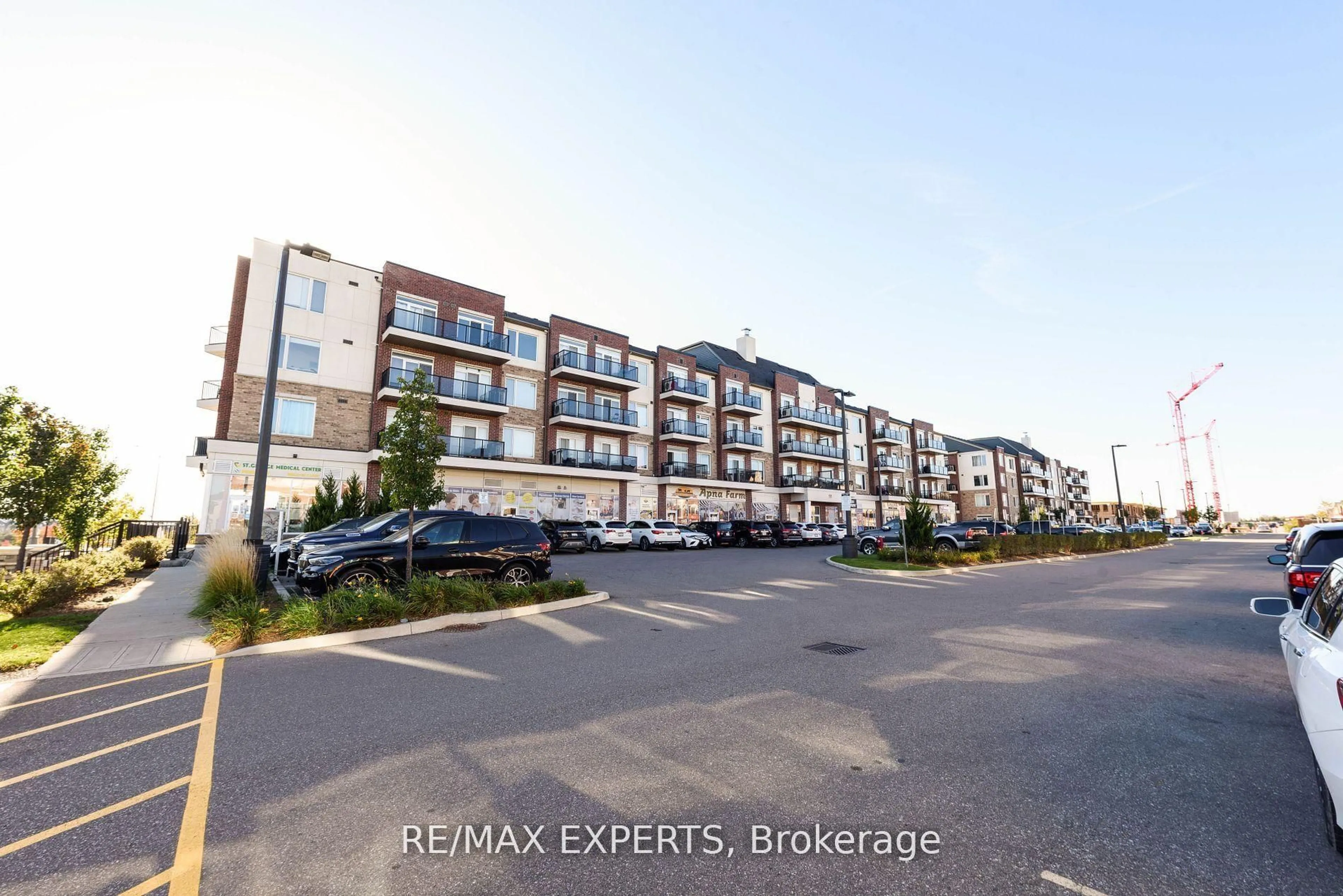 A pic from outside/outdoor area/front of a property/back of a property/a pic from drone, street for 50 Sky Harbour Dr #203, Brampton Ontario L6Y 6B8