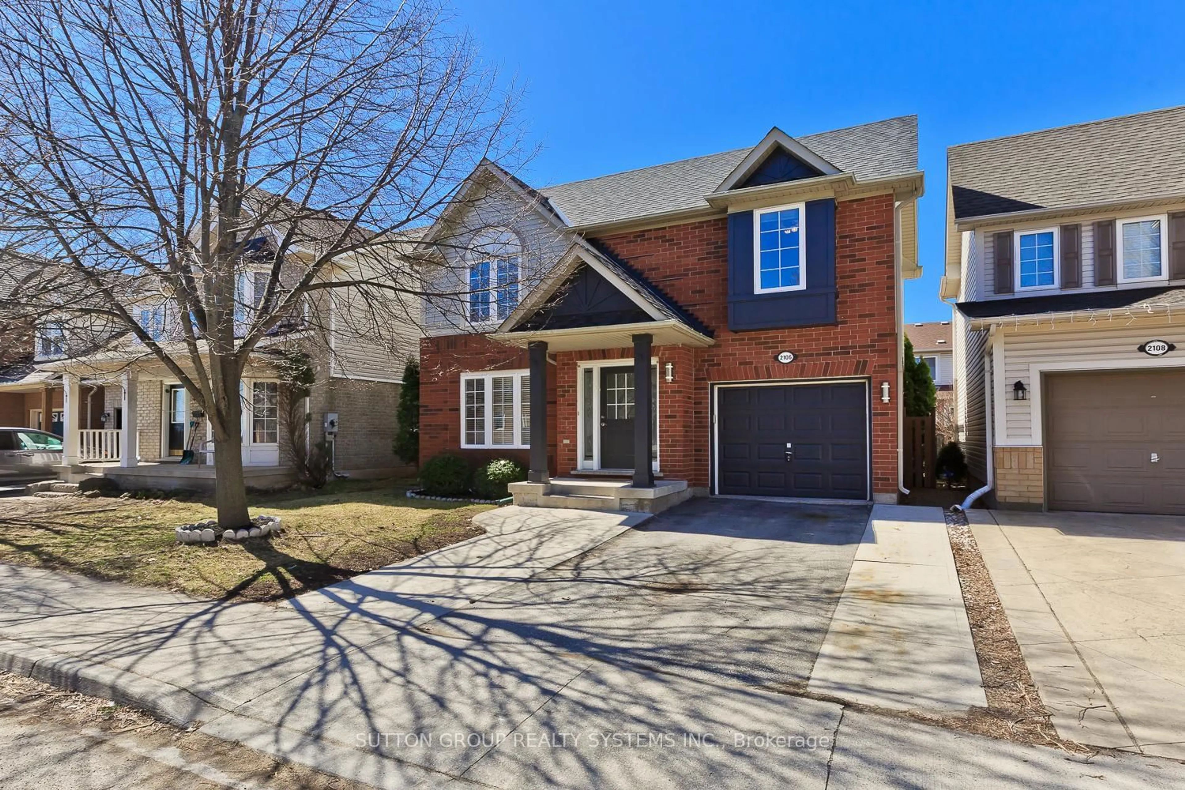 Home with brick exterior material, street for 2106 Dunmore Ave, Burlington Ontario L7L 6V9