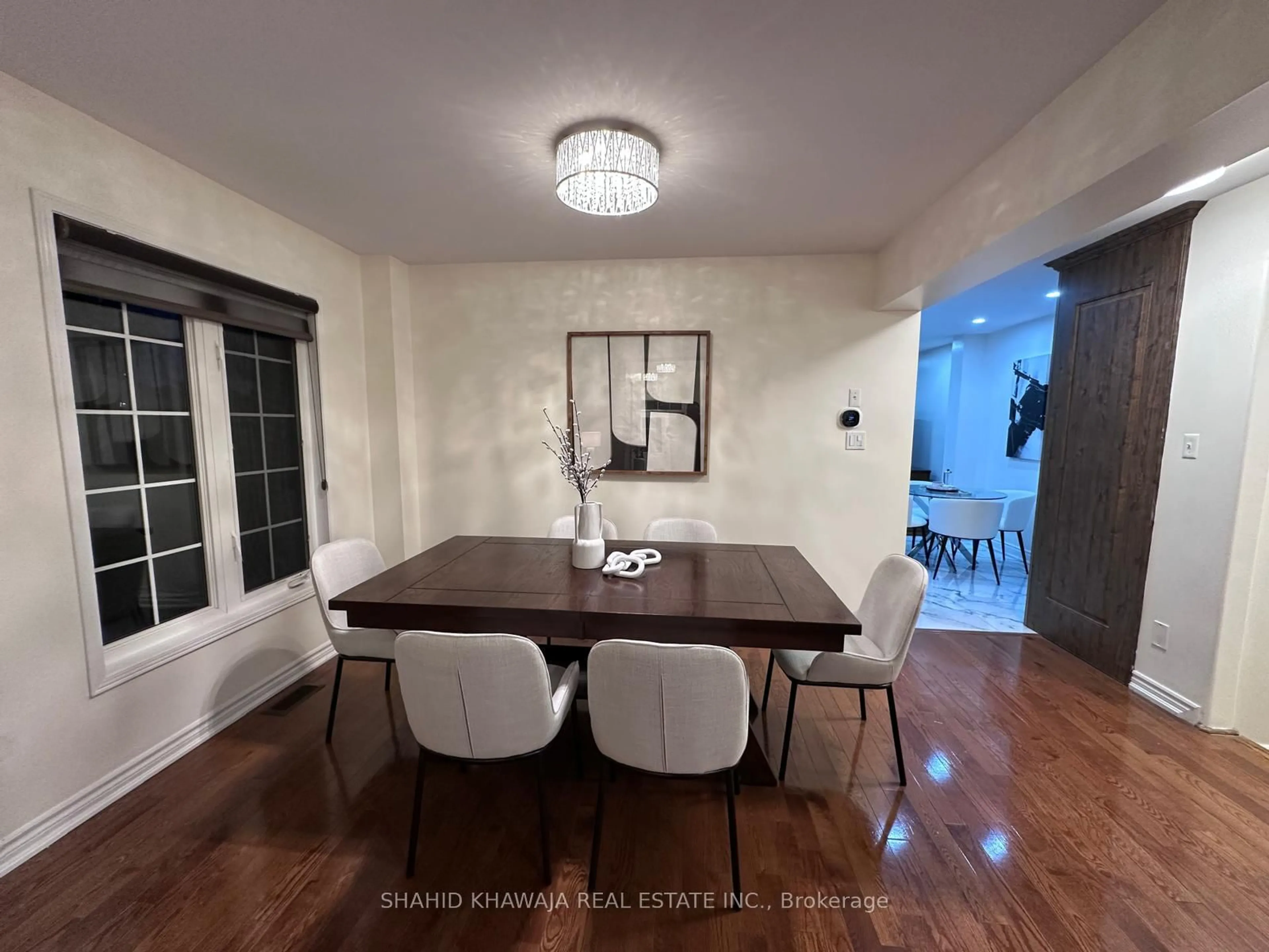 Dining room, wood/laminate floor for 3053 Cabano Cres, Mississauga Ontario L5M 0C6