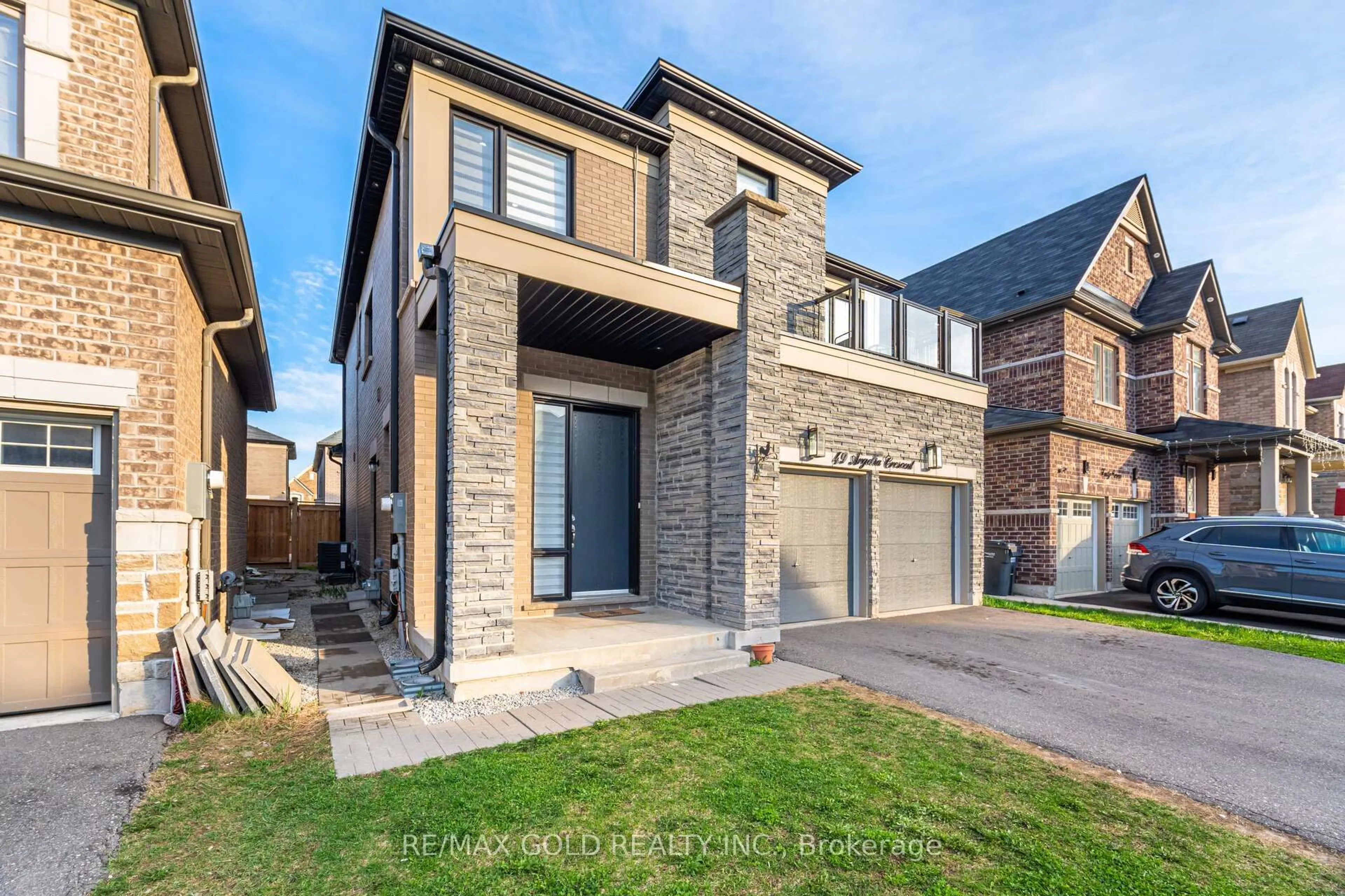 Home with brick exterior material, street for 49 Argelia Cres, Brampton Ontario L6X 5N5