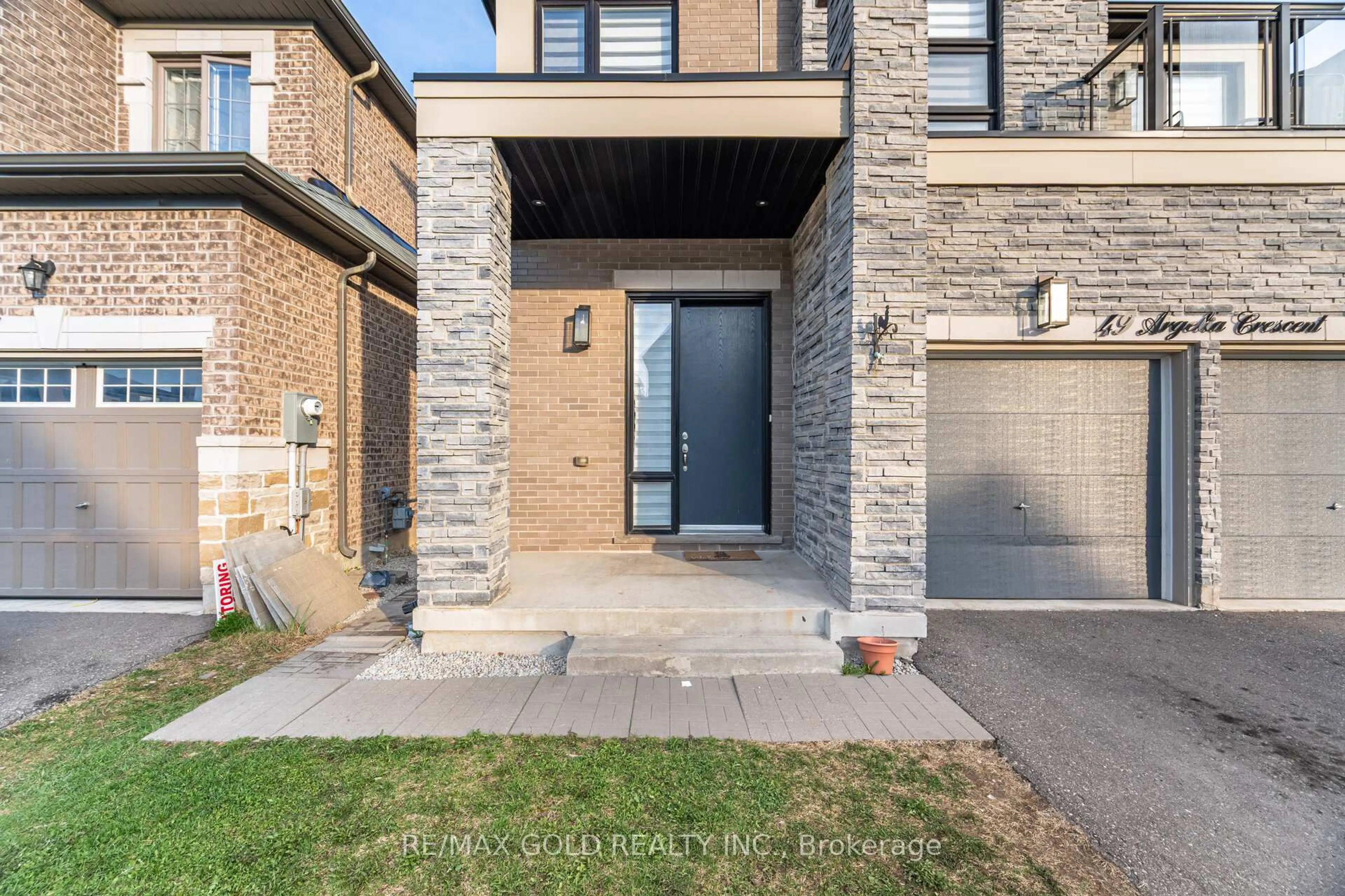 Home with brick exterior material, street for 49 Argelia Cres, Brampton Ontario L6X 5N5
