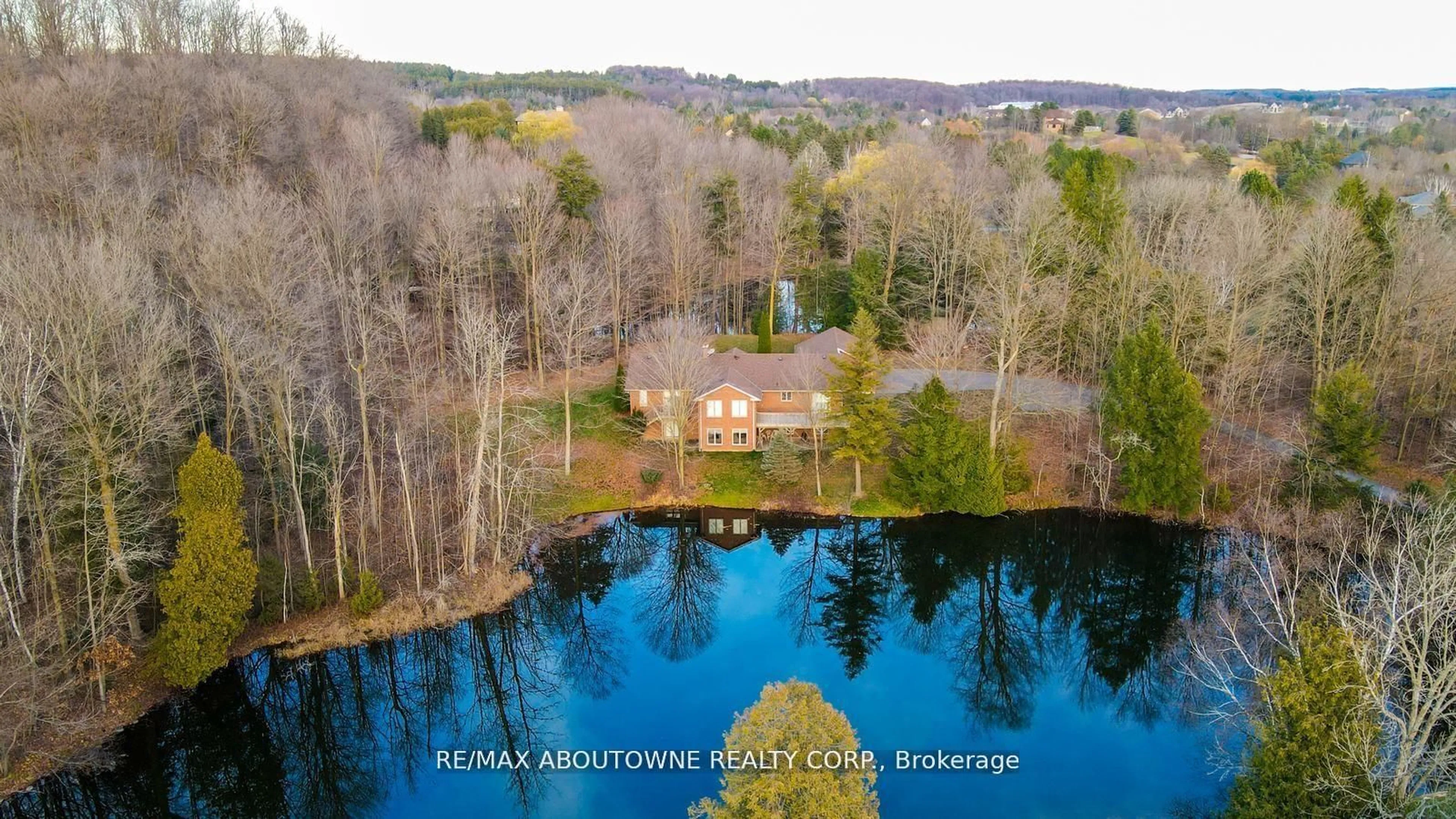 A pic from outside/outdoor area/front of a property/back of a property/a pic from drone, water/lake/river/ocean view for 22 Matson Dr, Caledon Ontario L7E 0A9