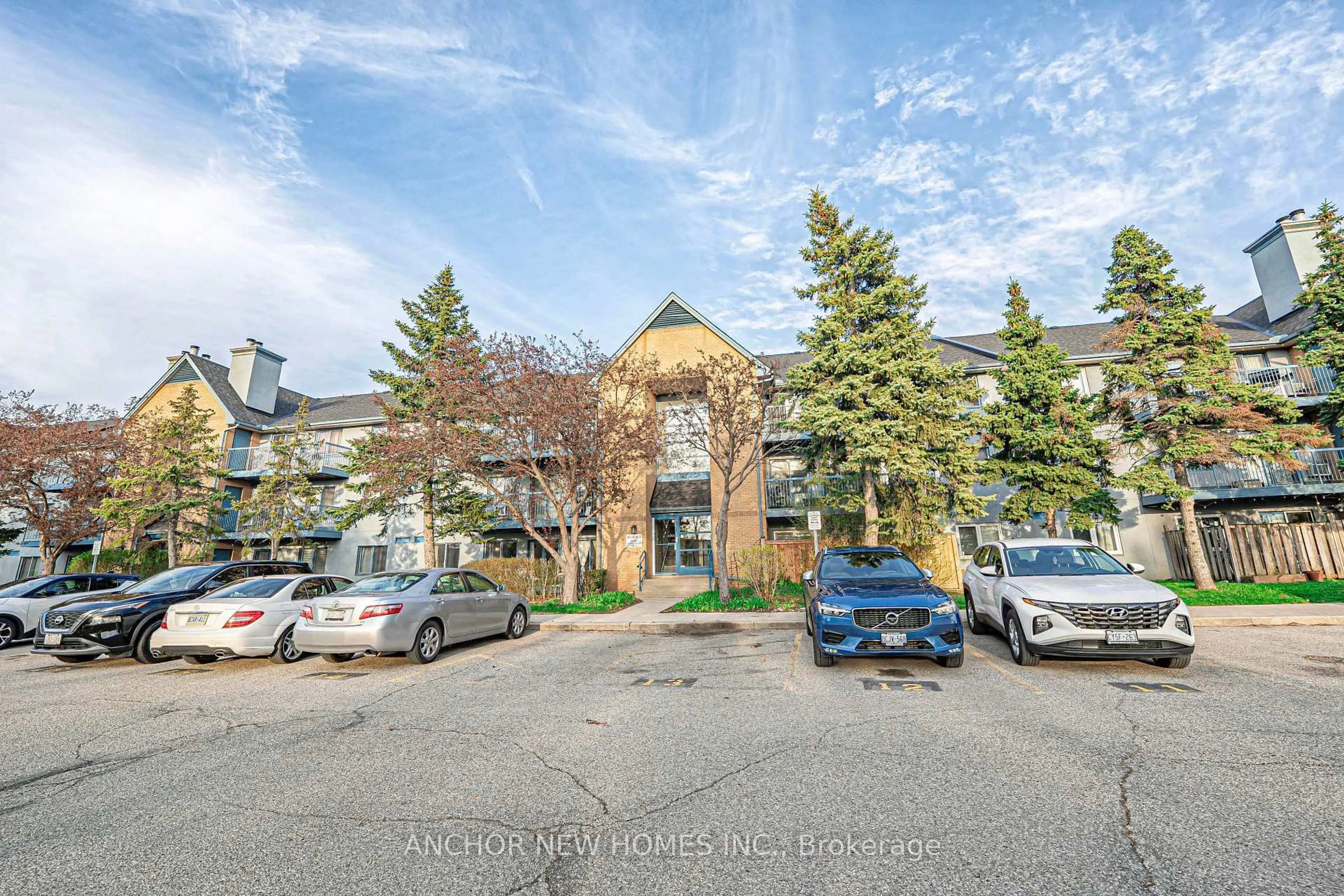 A pic from outside/outdoor area/front of a property/back of a property/a pic from drone, mountain view for 65 Trailwood Dr #213, Mississauga Ontario L4Z 3L1