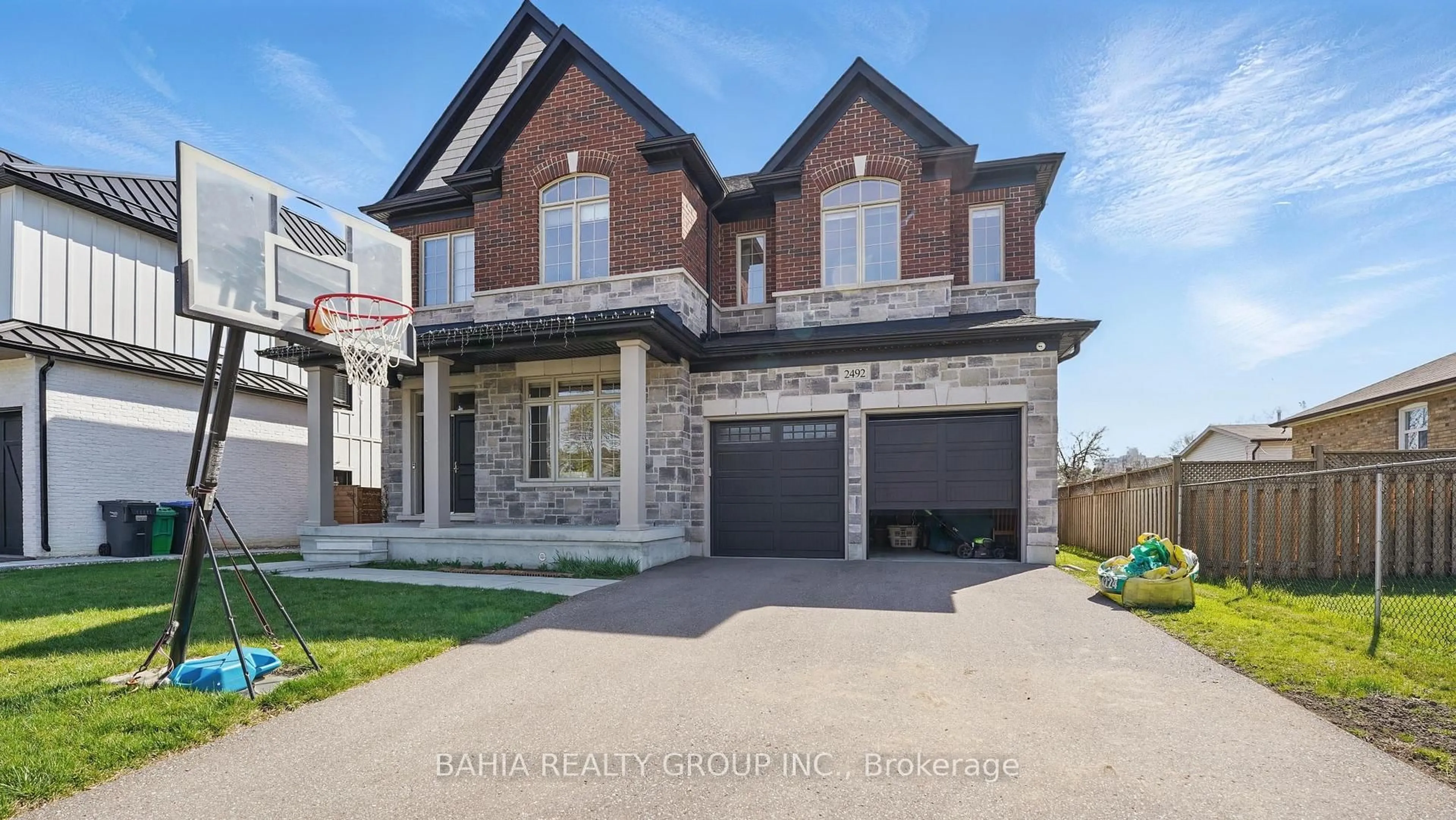 Home with brick exterior material, street for 2492 Donnavale Dr, Mississauga Ontario L5A 2N1