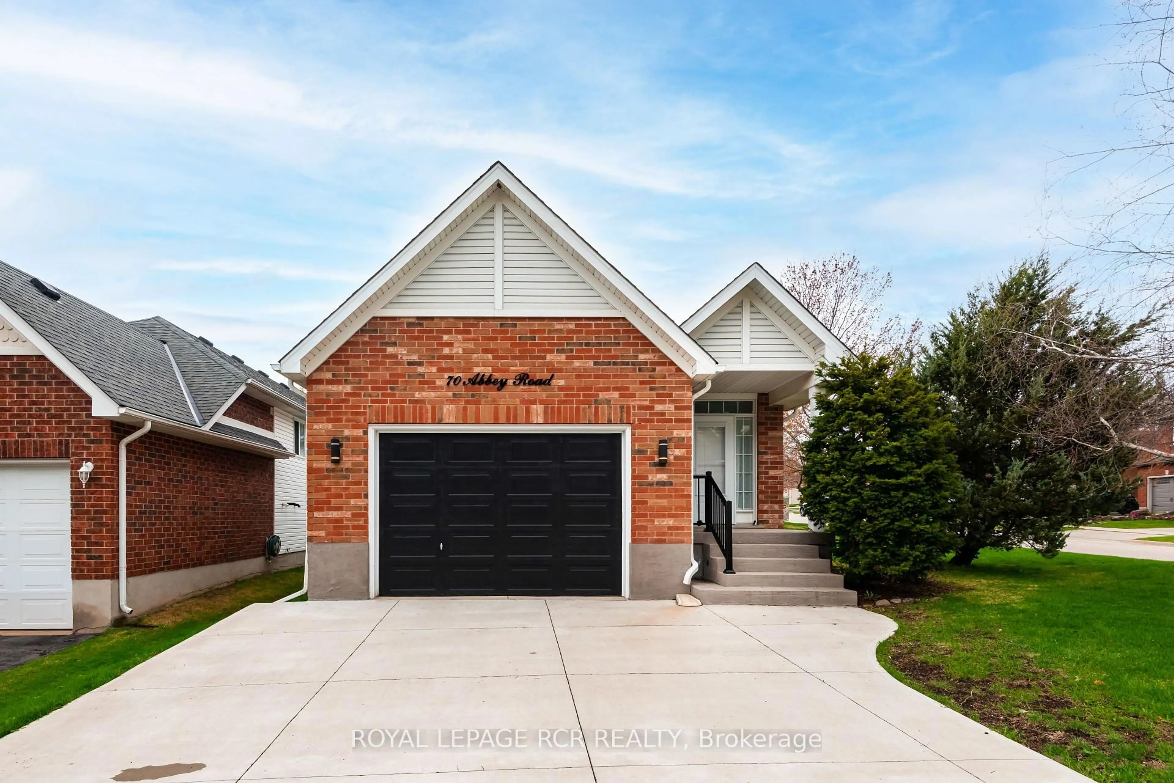 Home with brick exterior material, street for 70 Abbey Rd, Orangeville Ontario L9W 5E4