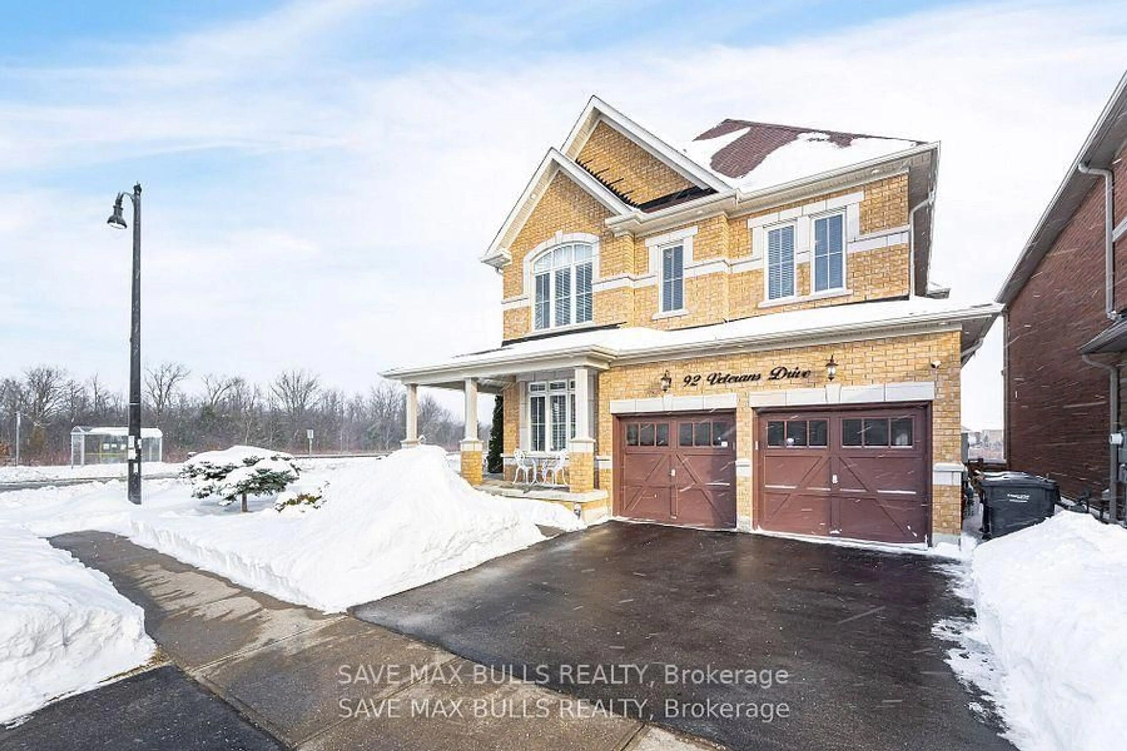 Home with brick exterior material, street for 92 Veterans Dr, Brampton Ontario L7A 3Z7