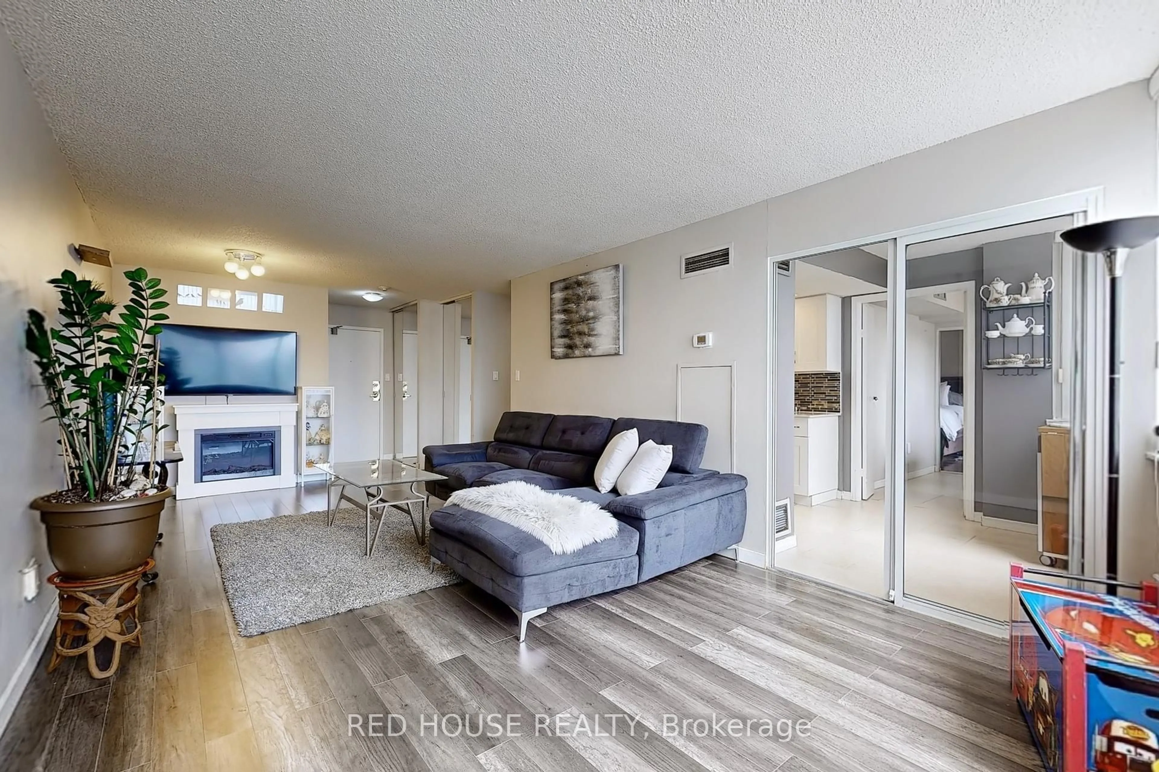 Living room with furniture, unknown for 10 Markbrook Lane #206, Toronto Ontario M9V 5E3