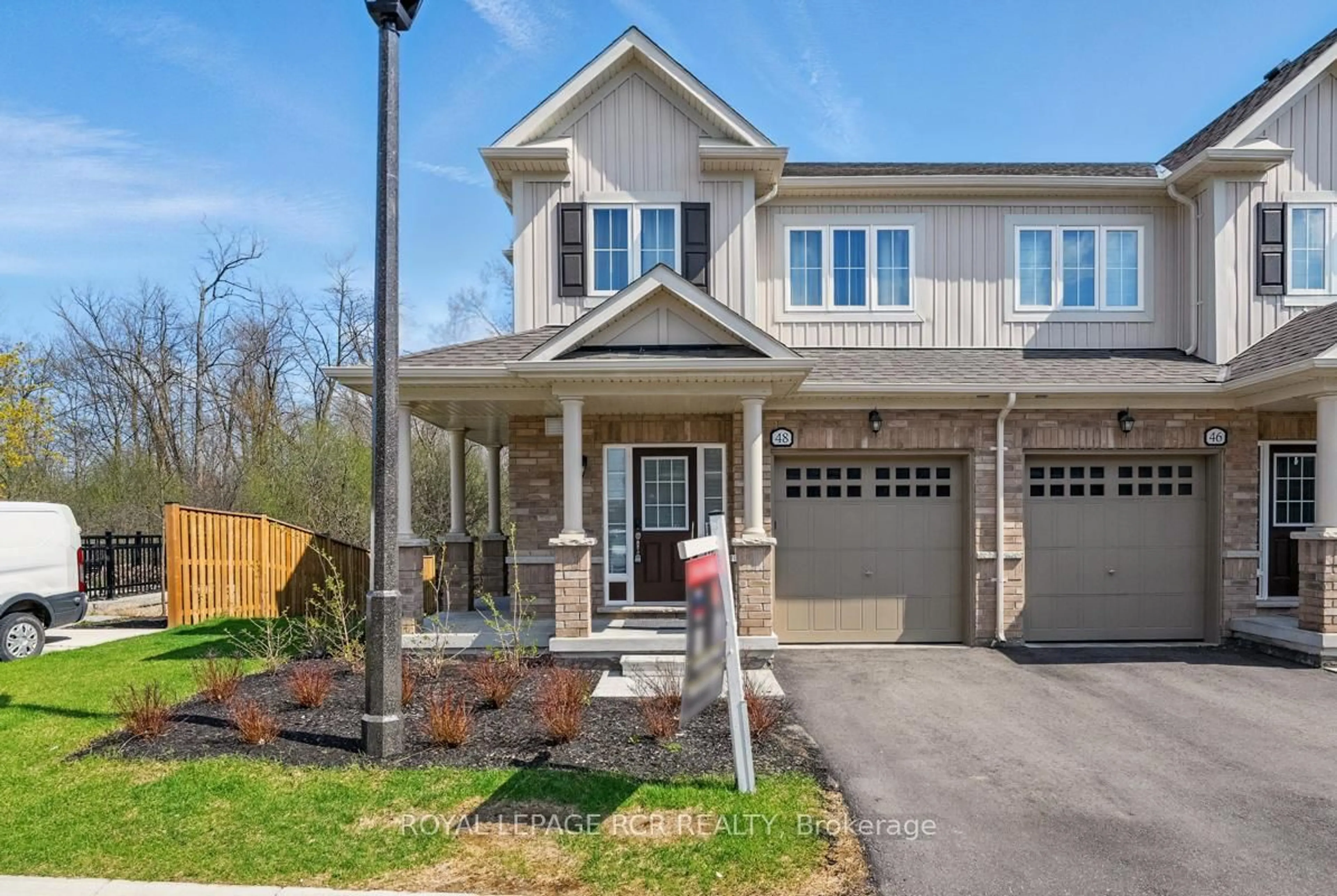 Home with brick exterior material, street for 48 Brixham Lane, Brampton Ontario L7A 5K2