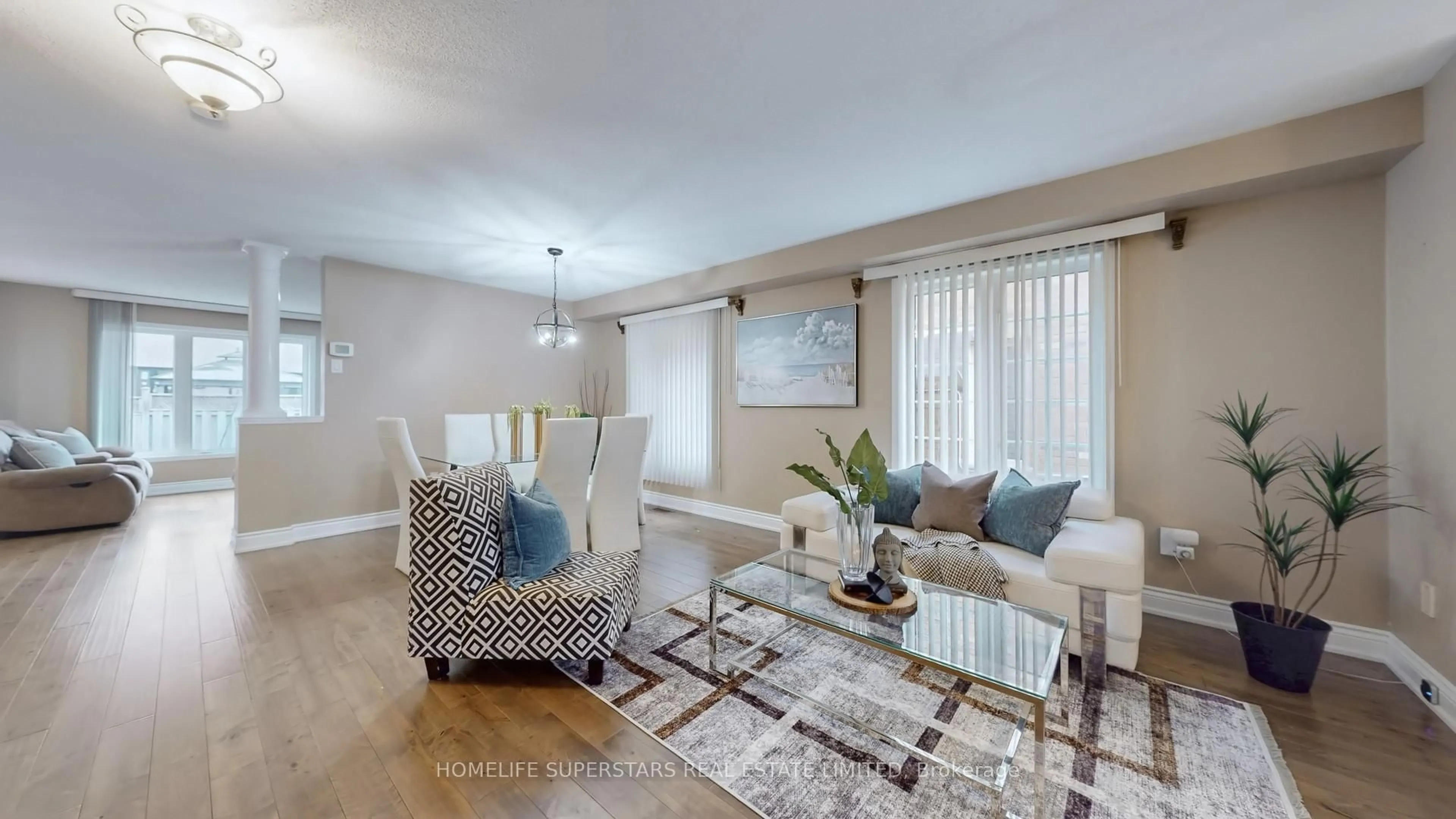 Living room with furniture, wood/laminate floor for 30 HOPECREST Pl, Brampton Ontario L6R 2T8