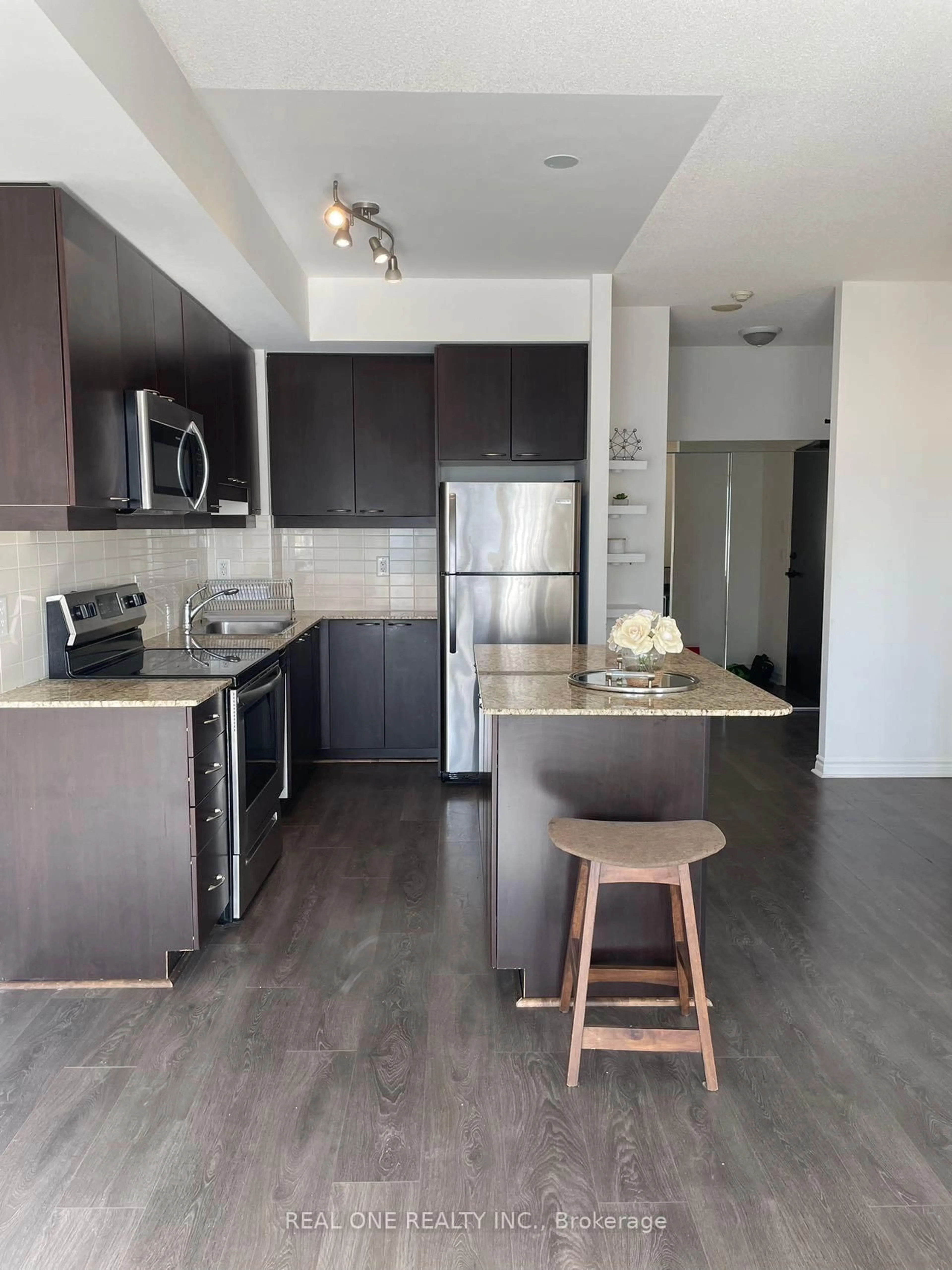 Open concept kitchen, wood/laminate floor for 385 Prince Of Wales Dr #3006, Mississauga Ontario L5B 0C6