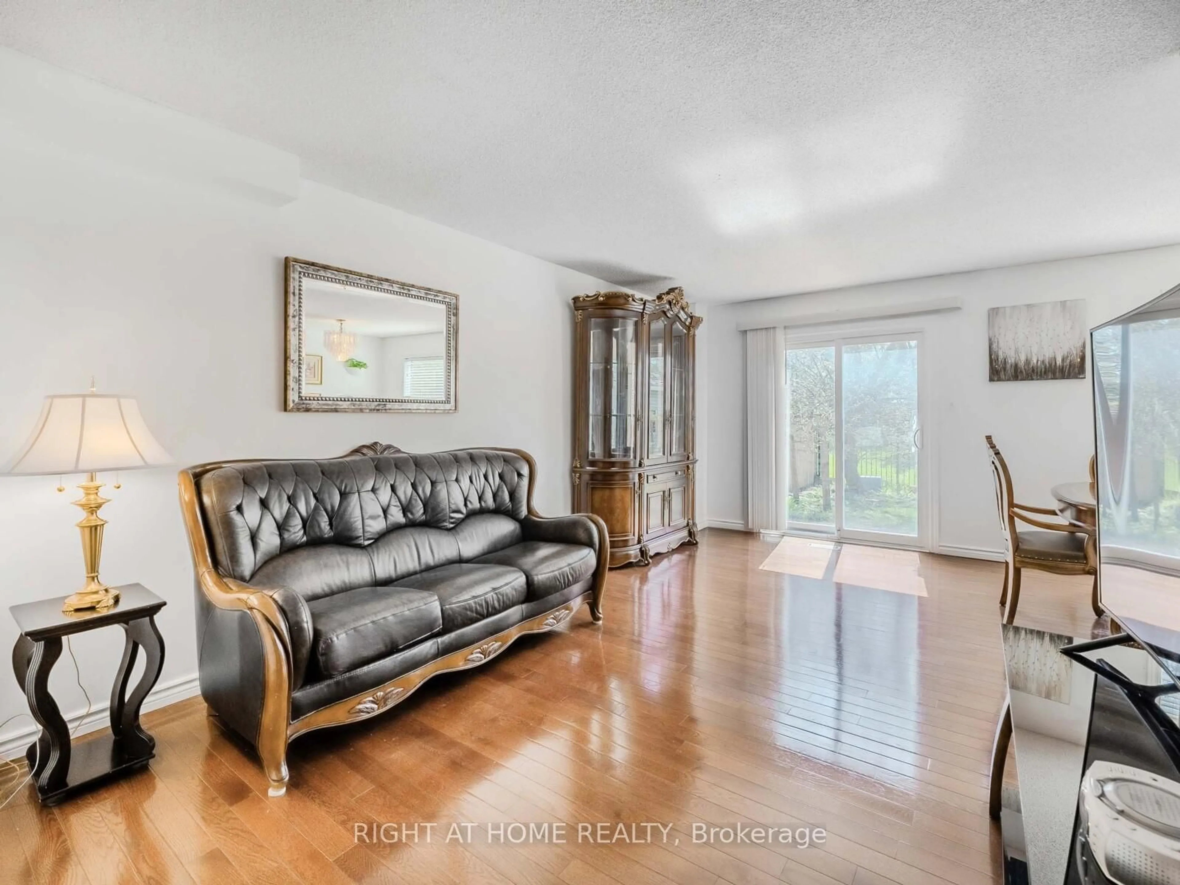 Living room with furniture, unknown for 165 Simmons Blvd, Brampton Ontario L6V 3Y2