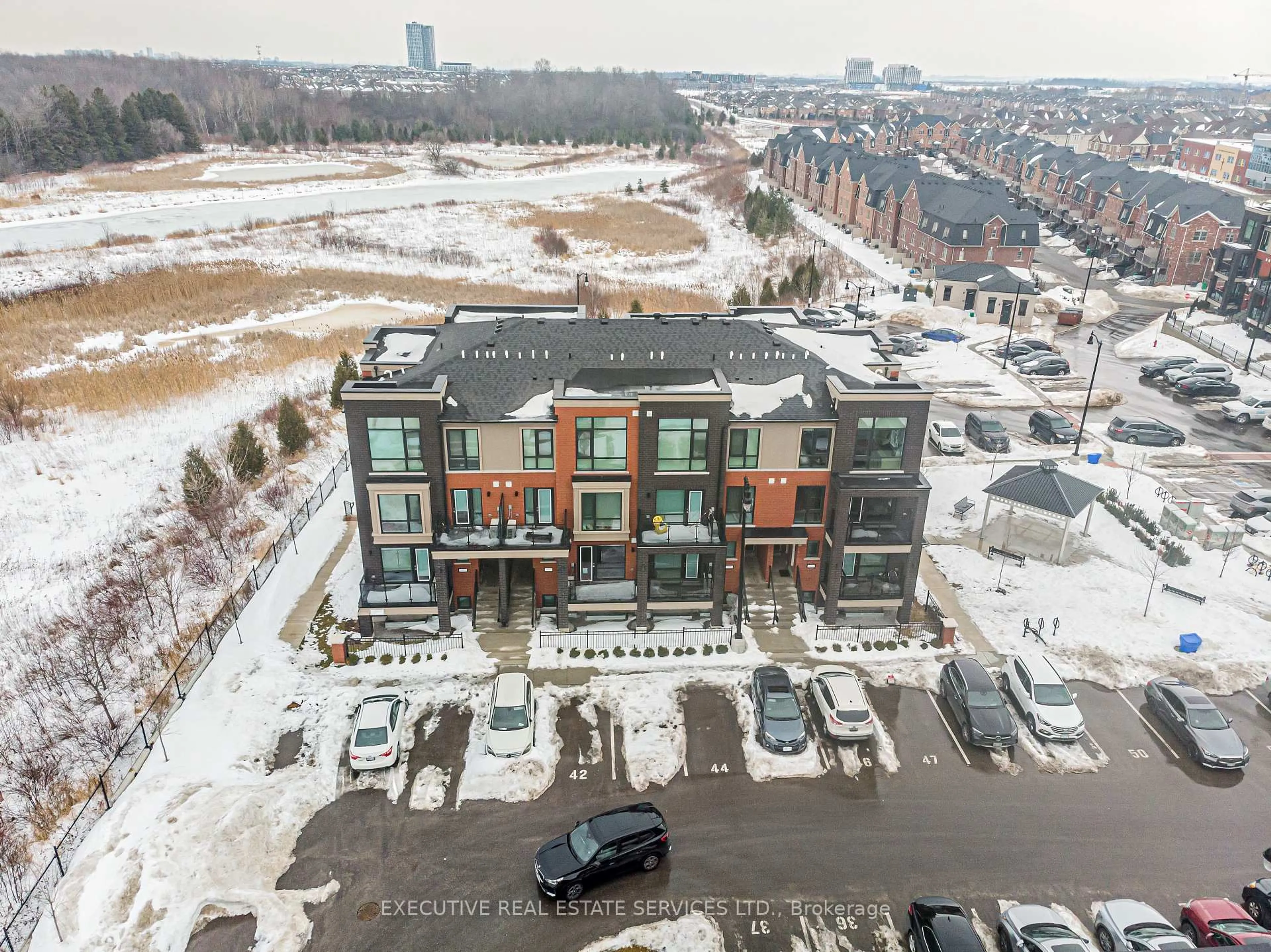 A pic from outside/outdoor area/front of a property/back of a property/a pic from drone, unknown for 155 Veterans Dr #10, Brampton Ontario L7A 5L2