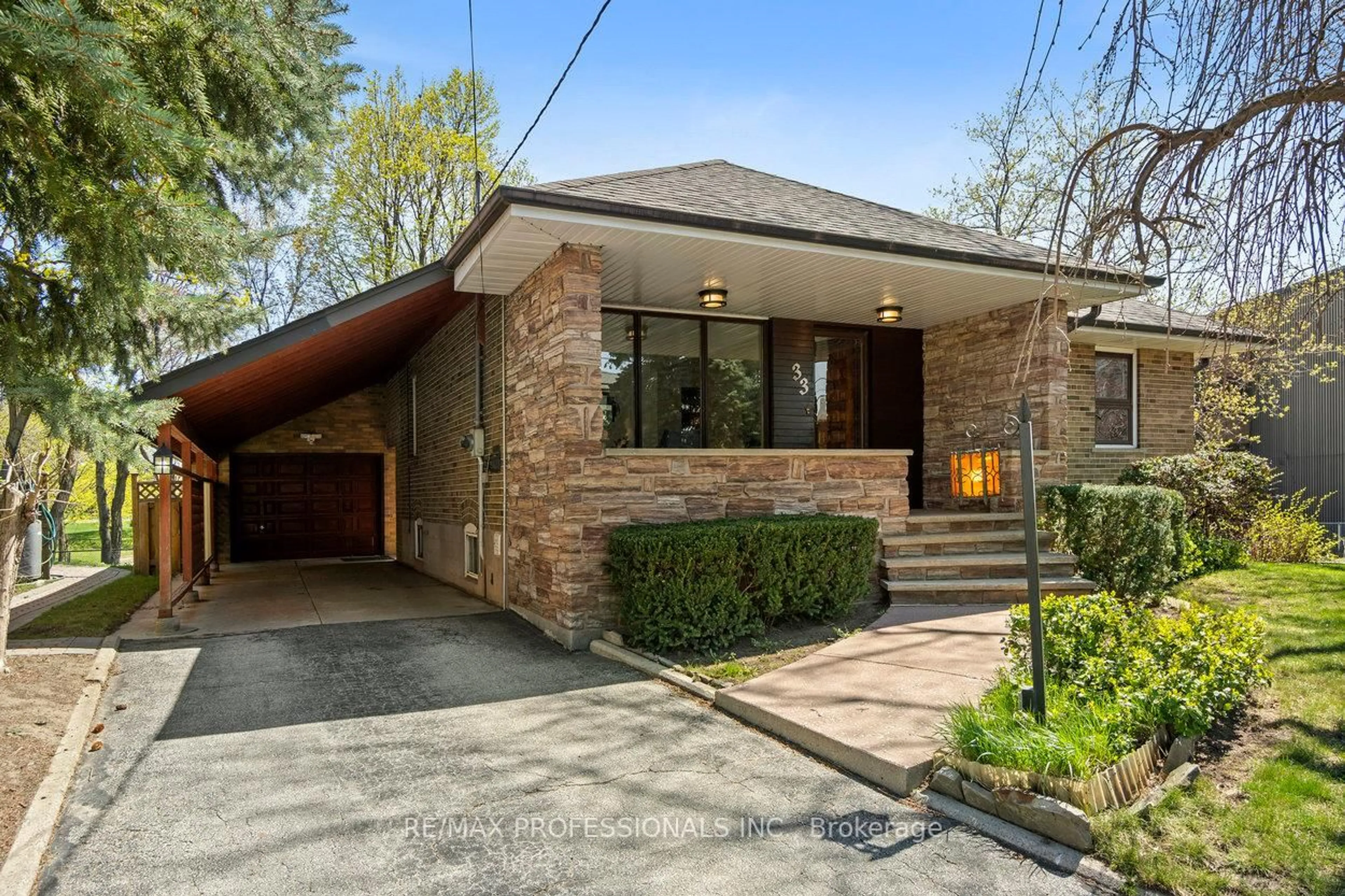 Home with brick exterior material, street for 33 Heathrow Dr, Toronto Ontario M3M 1X1