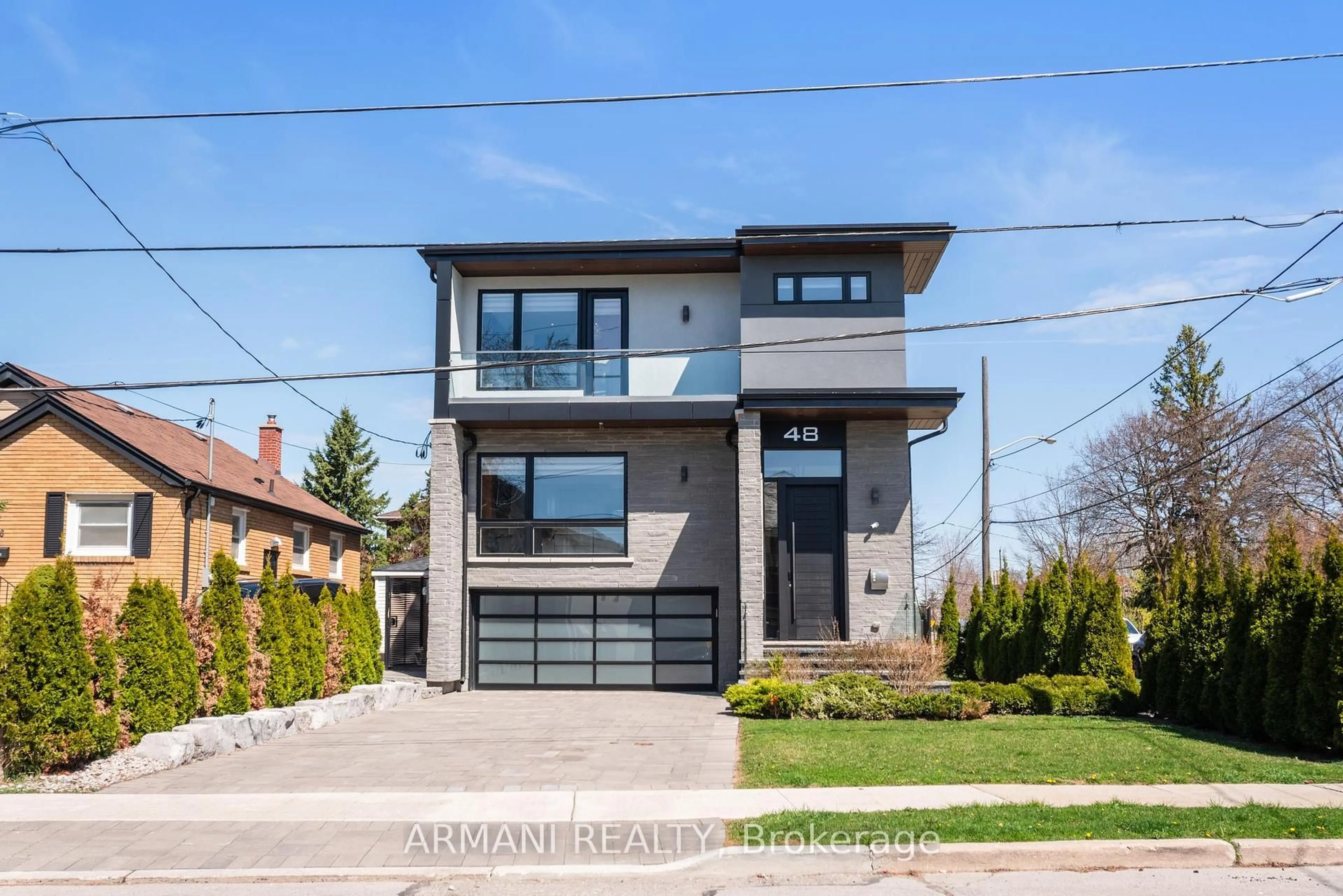 Home with brick exterior material, street for 48 Cornelius Pkwy, Toronto Ontario M6L 2K4