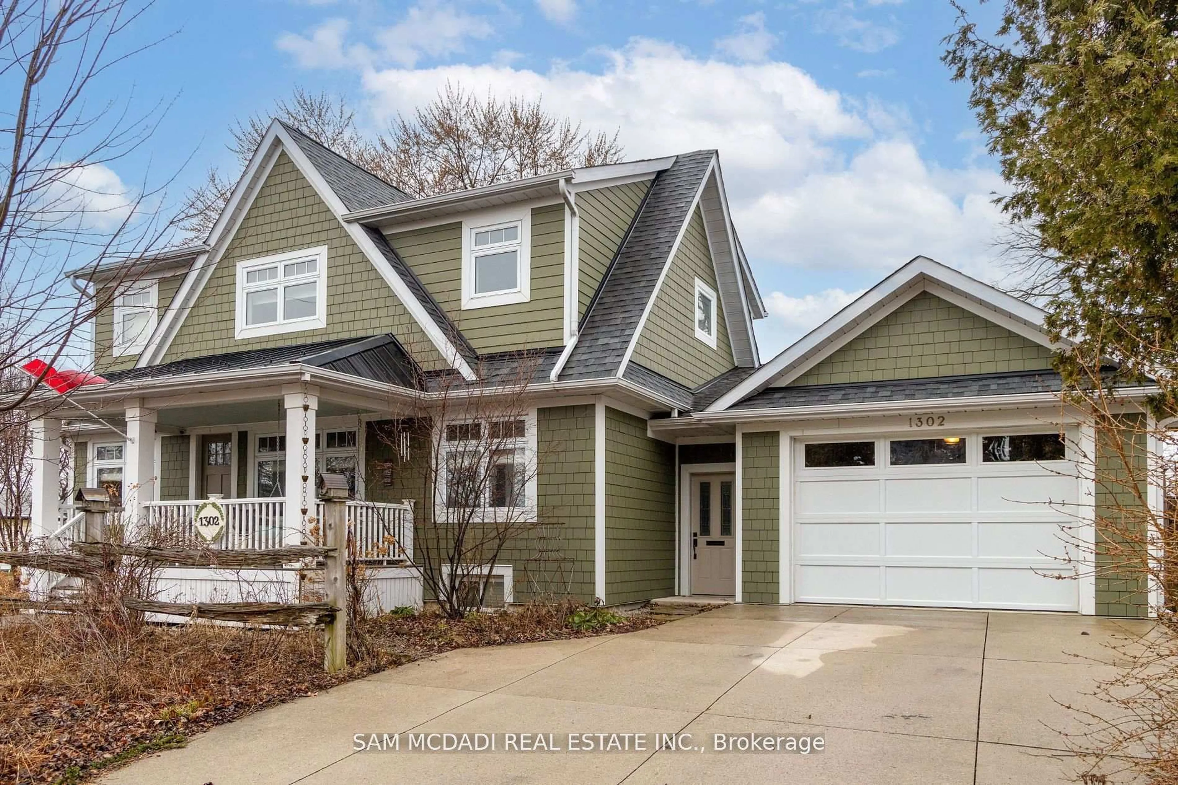 Home with vinyl exterior material, street for 1302 Meredith Ave, Mississauga Ontario L5E 2E7