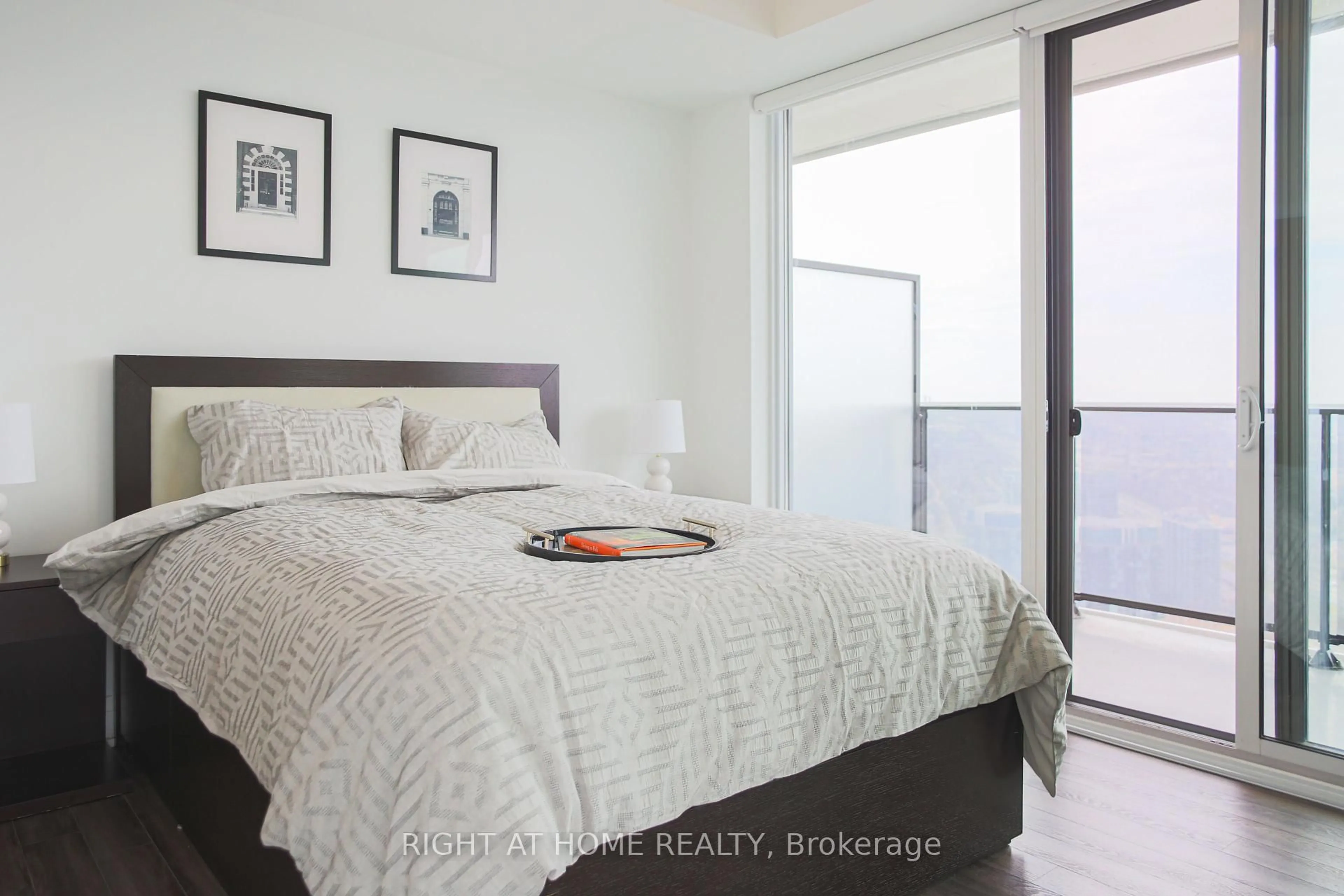 Bedroom with bed, wood/laminate floor for 70 Annie Craig Dr #5002, Toronto Ontario M8V 0G2