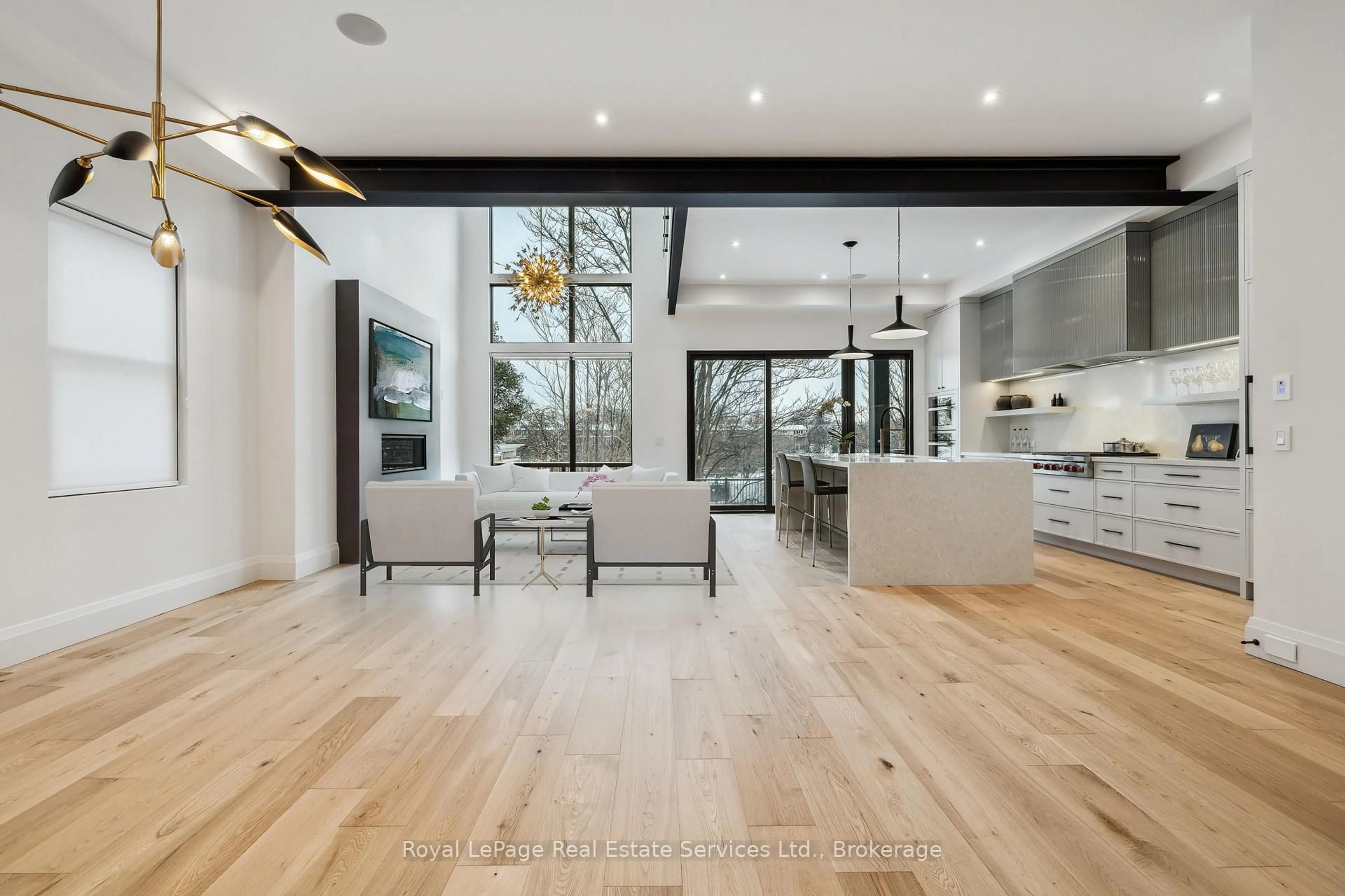Open concept kitchen, wood/laminate floor for 68 Navy St, Oakville Ontario L6J 2Y9
