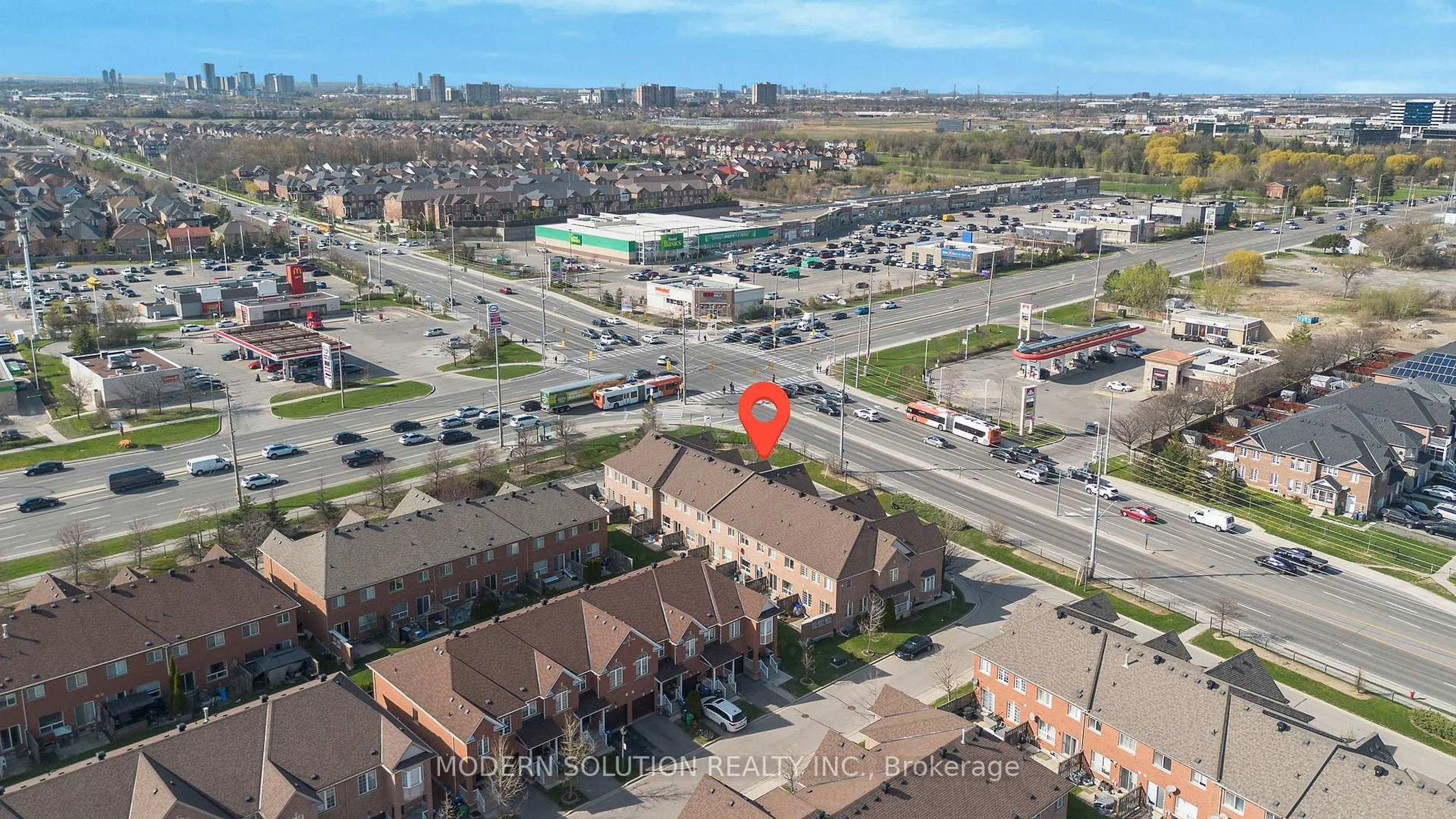 A pic from outside/outdoor area/front of a property/back of a property/a pic from drone, street for 525 Novo Star Dr #100, Mississauga Ontario L5W 1X9