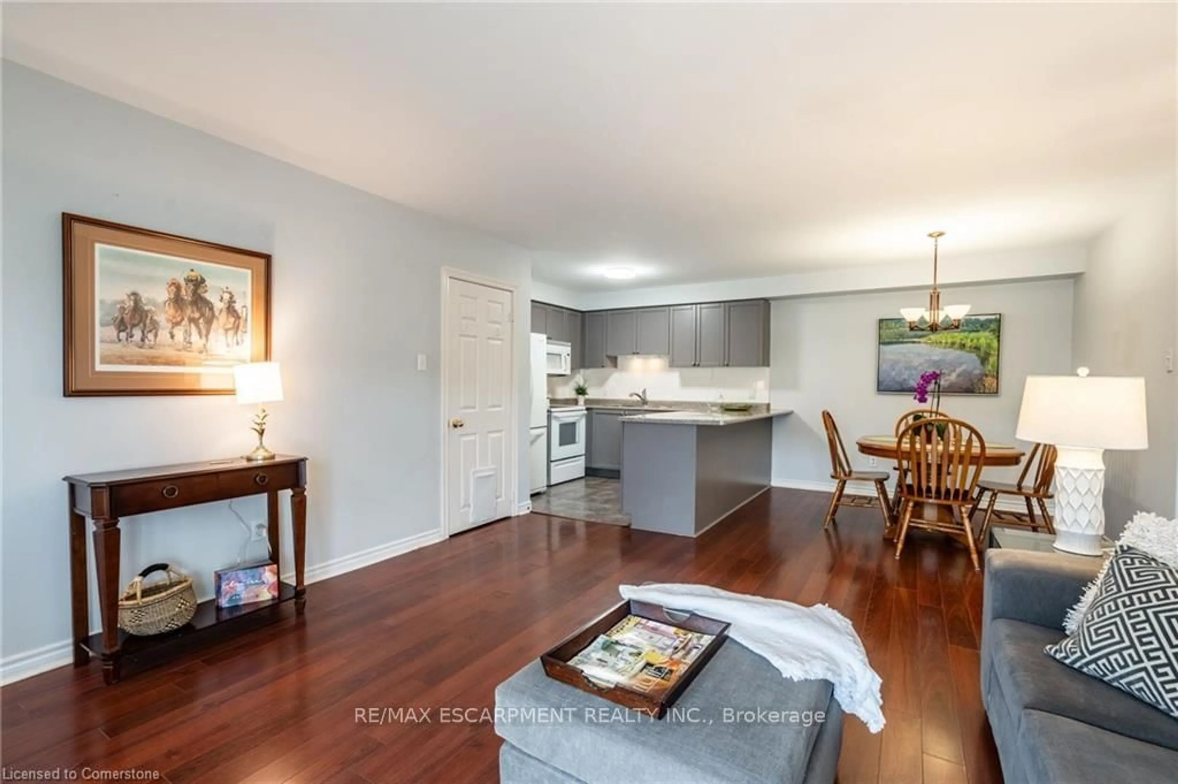 Open concept kitchen, wood/laminate floor for 1701 Lampman Ave #201, Burlington Ontario L7L 6R7