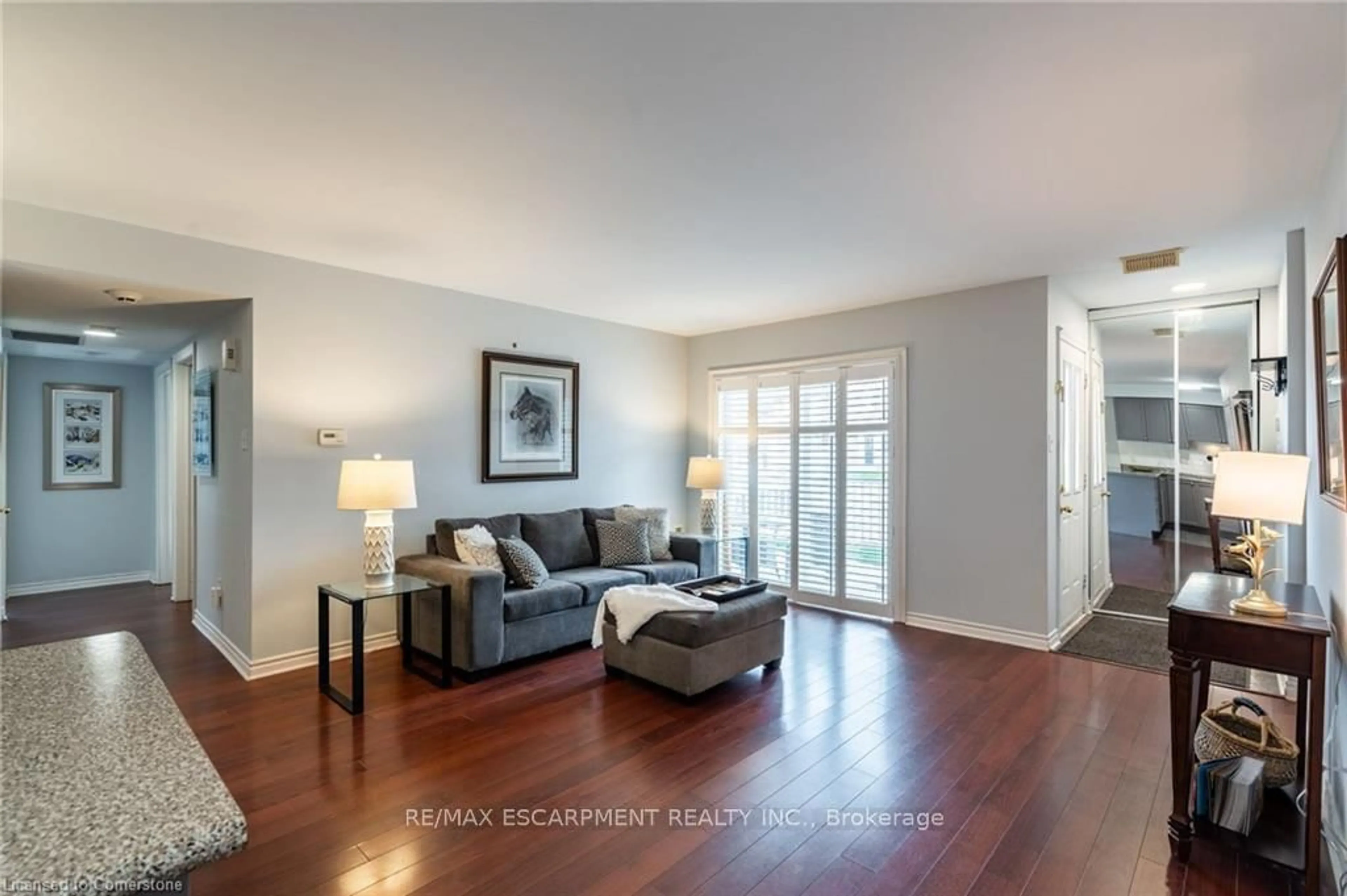 Living room with furniture, wood/laminate floor for 1701 Lampman Ave #201, Burlington Ontario L7L 6R7
