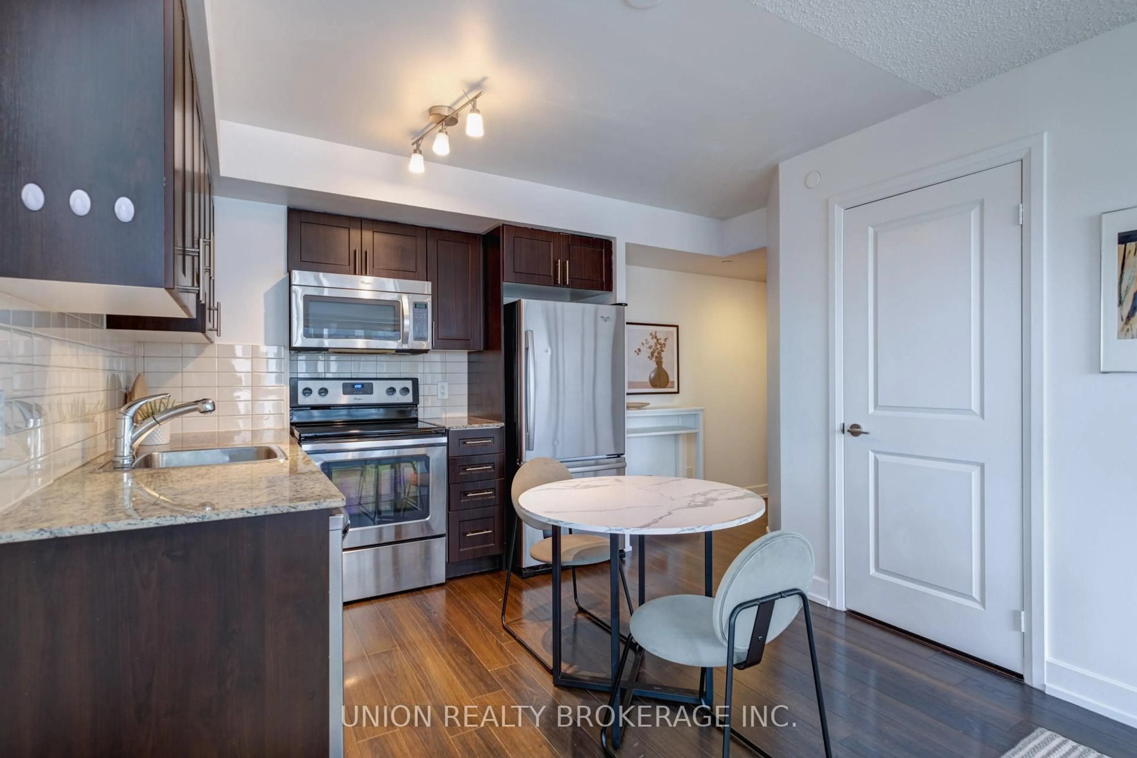 Open concept kitchen, unknown for 2 Eva Rd #824, Toronto Ontario M9C 0A9